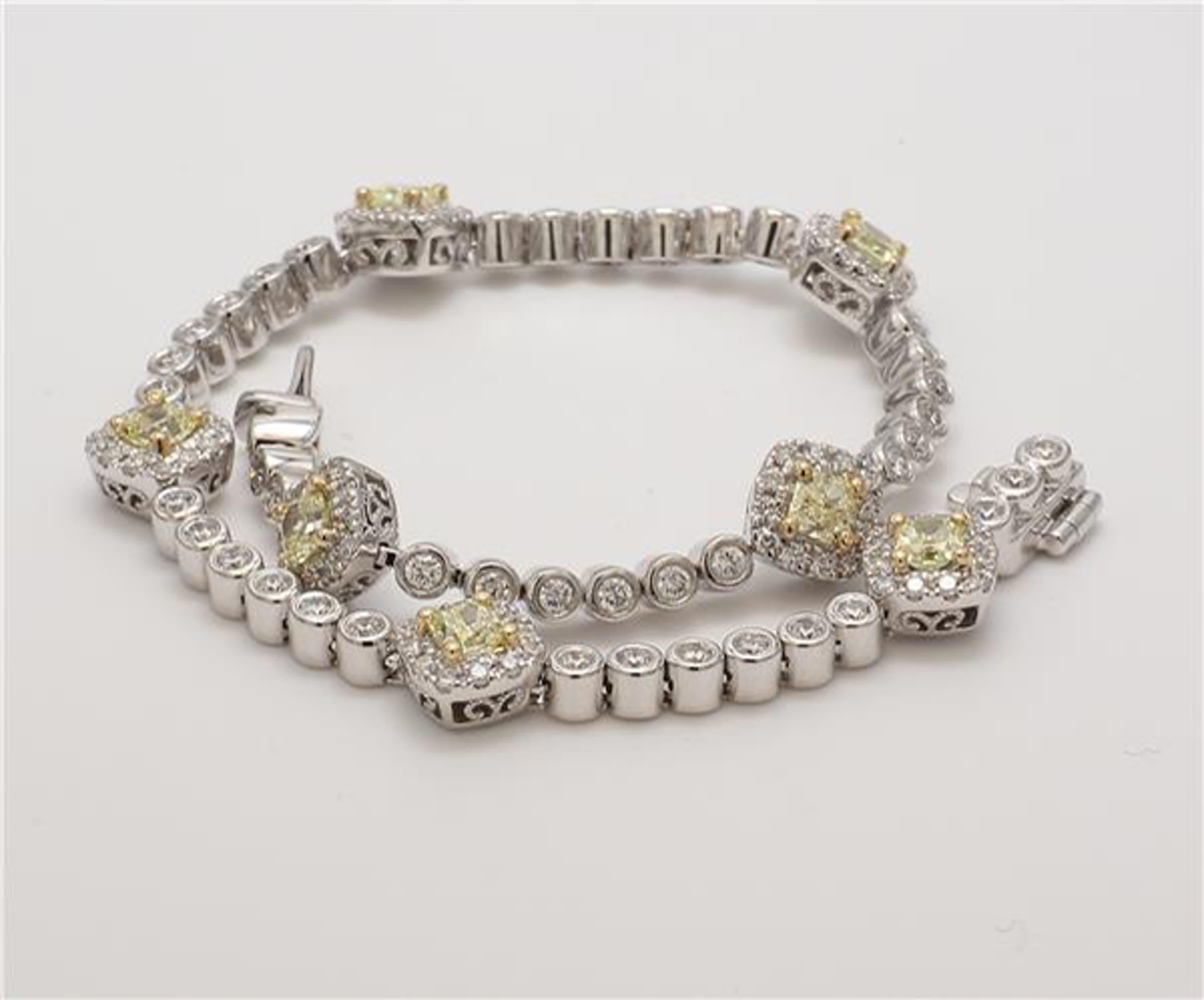 RareGemWorld's classic natural radiant cut yellow diamond bracelet. Mounted in a beautiful 14K Yellow and White Gold setting with 7 natural radiant cut yellow diamonds. The yellow diamonds are surrounded by small round natural white diamond melee as