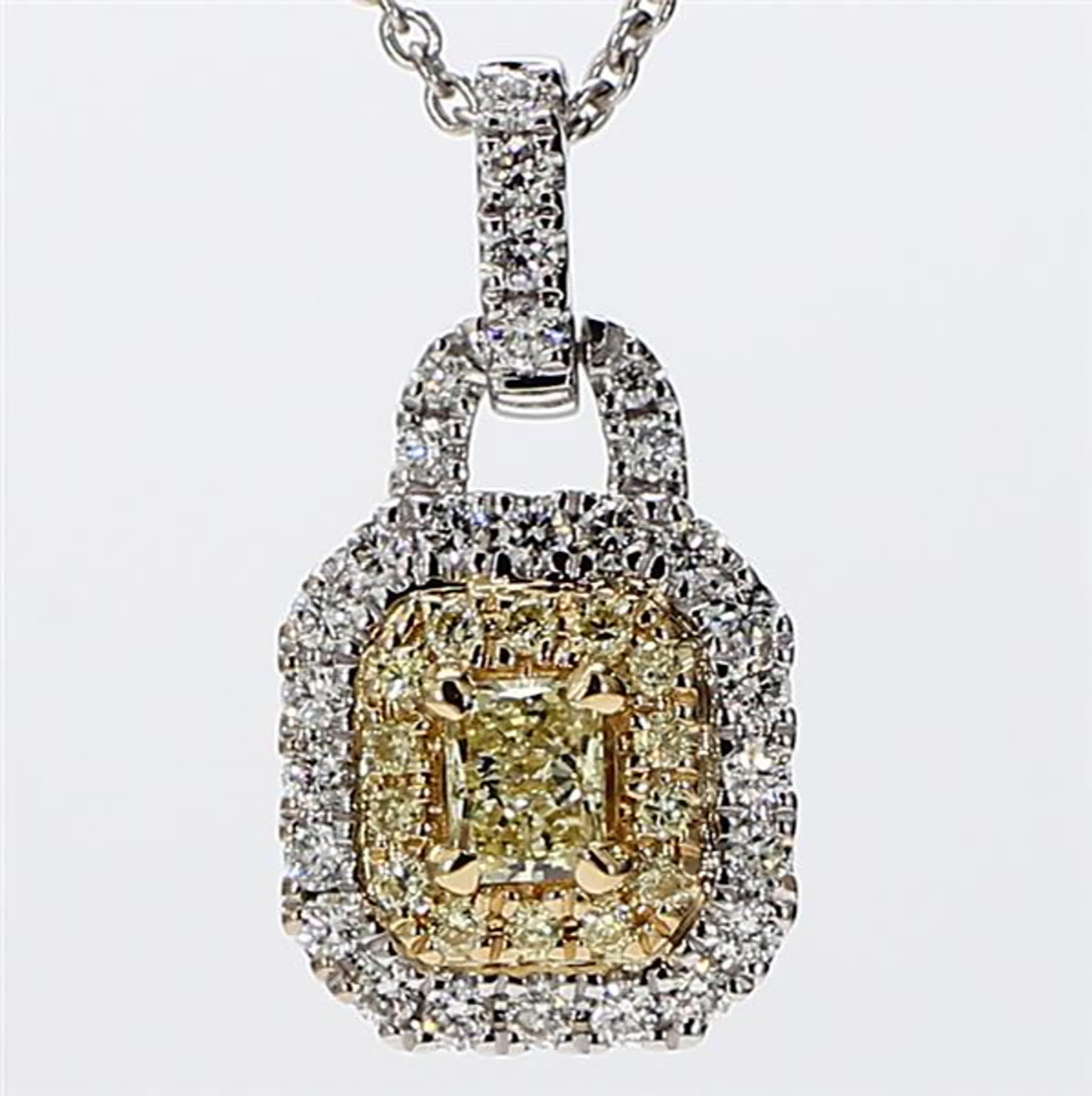 RareGemWorld's classic diamond pendant. Mounted in a beautiful 18K Yellow and White Gold setting with natural radiant cut yellow diamonds. The yellow diamonds are surrounded by small round natural white diamond melee. This pendant is guaranteed to