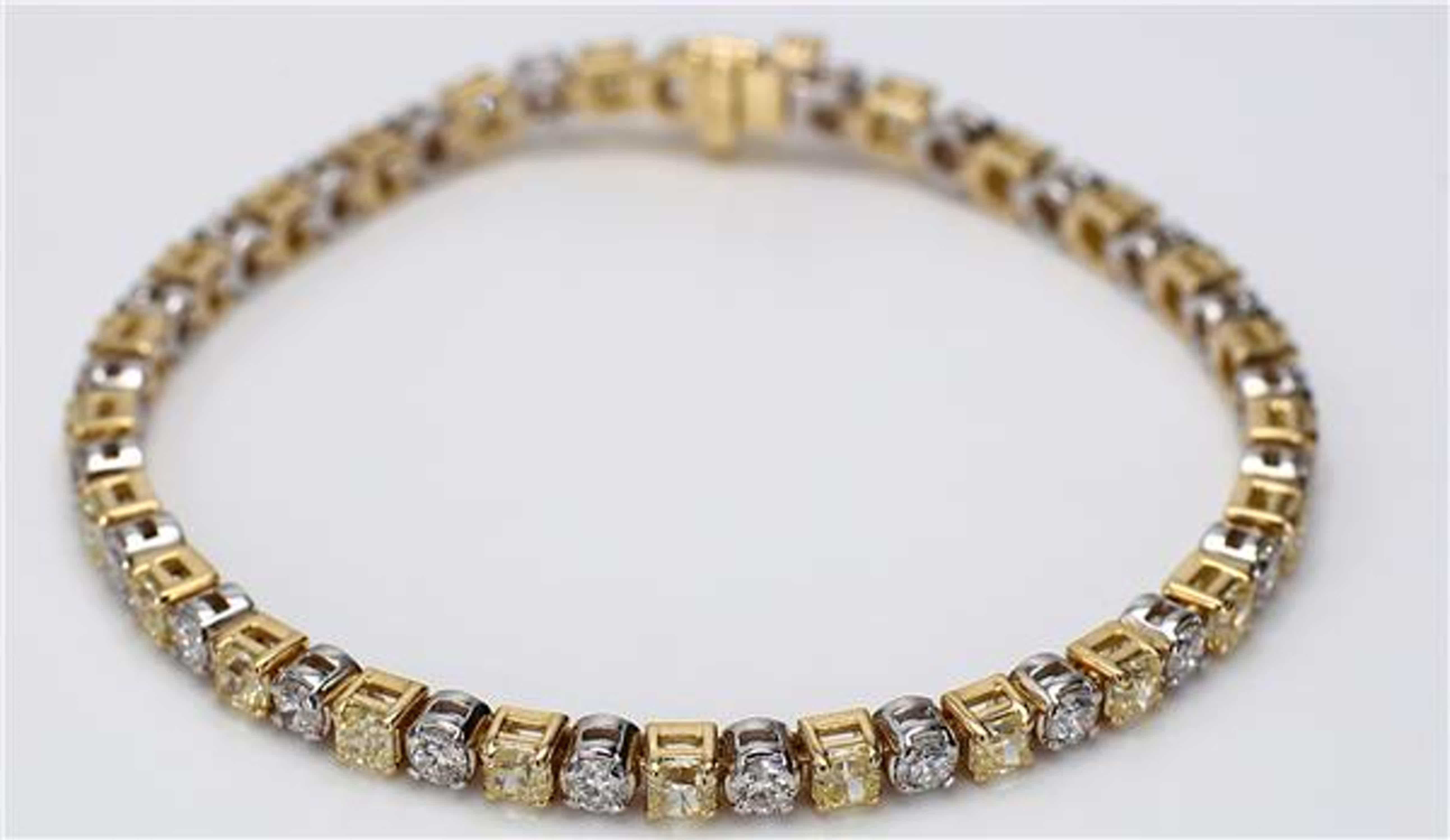 RareGemWorld's classic diamond bracelet. Mounted in a beautiful 18K Yellow and White Gold setting with natural radiant cut yellow diamonds. The yellow diamonds are complimented by natural round cut white diamonds. This bracelet is guaranteed to