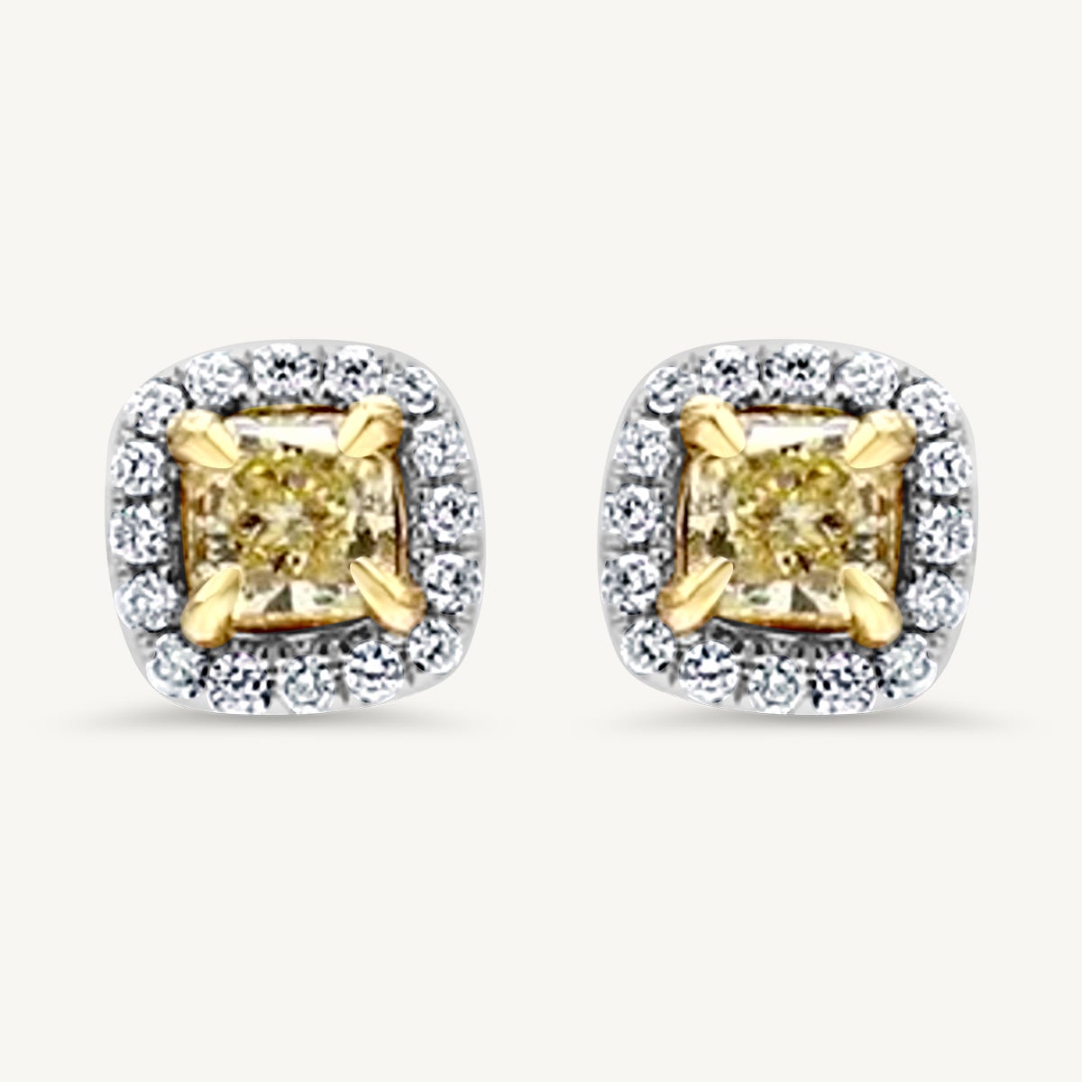 Natural Yellow Radiant and White Diamond .89 Carat TW Gold Stud Earrings For Sale