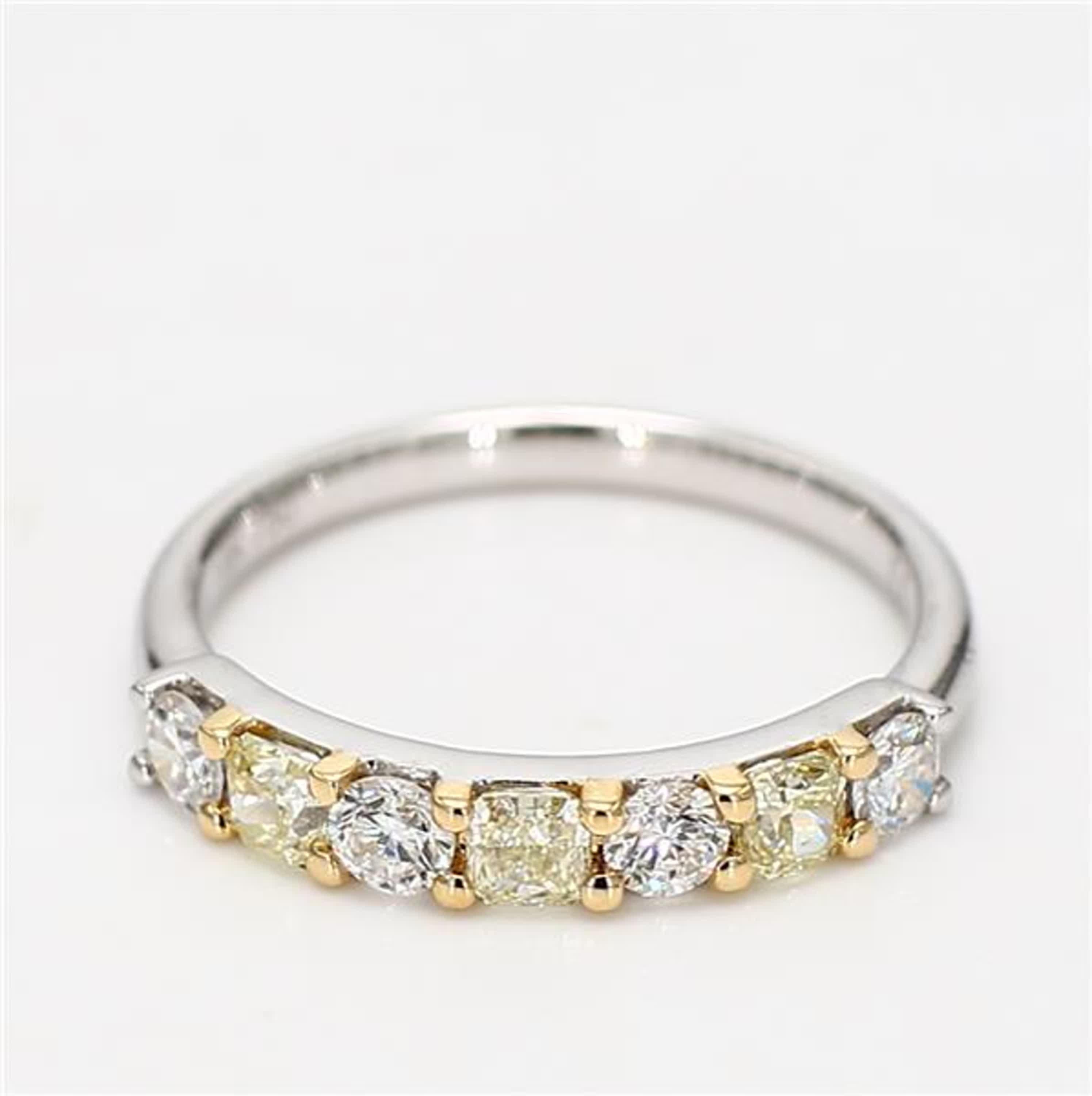 RareGemWorld's classic diamond band. Mounted in a beautiful 18K Yellow and White Gold setting with natural radiant cut yellow diamonds complimented by natural round cut white diamonds. This band is guaranteed to impress and enhance your personal