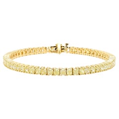 Bracelet tennis en or jaune naturel de 8.15 carats poids total et diamants taille radiant