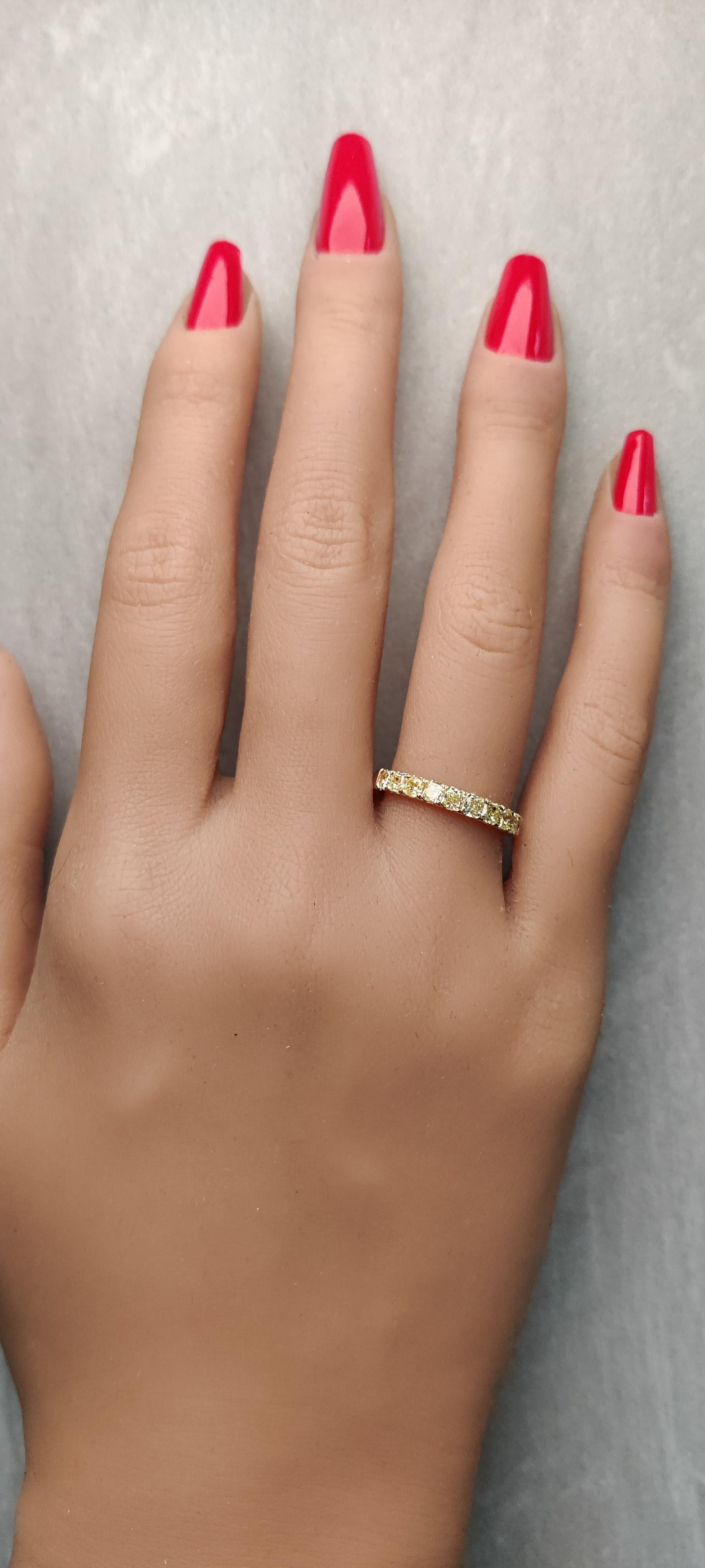 RareGemWorld's classic diamond band. Mounted in a beautiful 18K Yellow Gold setting with natural radiant yellow diamond's. This band is guaranteed to impress and enhance your personal collection!

Total Weight: 1.01cts

Natural Radiant Yellow