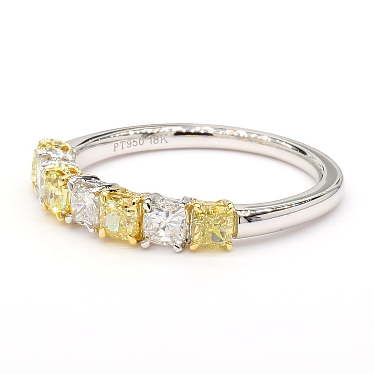 RareGemWorld's intriguing diamond band. Mounted in a beautiful platinum setting with natural radiant cut yellow diamonds complimented by natural radiant cut white diamonds. This band is guaranteed to impress and enhance your personal