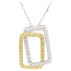 Ciondolo a goccia in oro giallo naturale con diamante bianco e rotondo da 0.66 carati TW