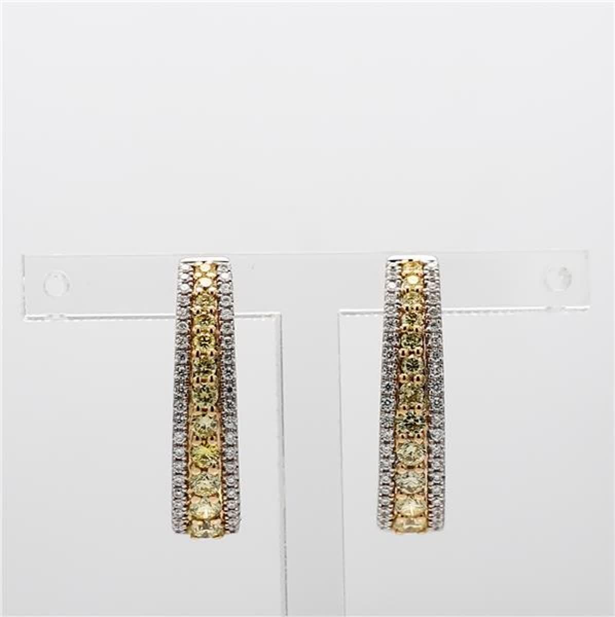 RareGemWorld's classic diamond earrings. Mounted in a beautiful 18K Yellow and White Gold setting with natural round cut yellow diamonds. These earrings include both natural round yellow diamond melee and natural round white diamond melee. These