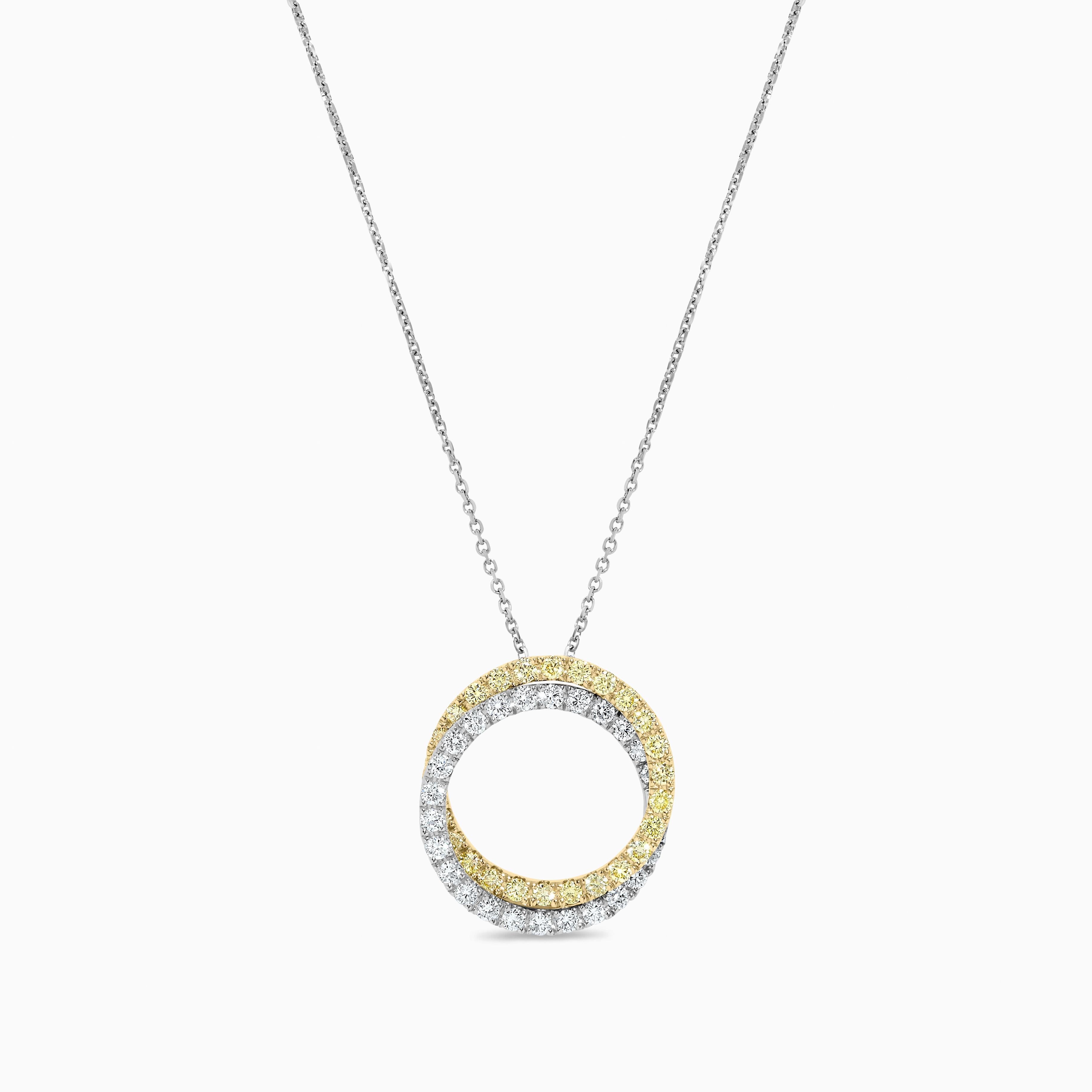 Il bellissimo ciondolo con diamante di RareGemworld. Montato in una splendida montatura in oro giallo e bianco 18 carati con un diamante giallo naturale rotondo e un diamante bianco naturale rotondo. Questa collana è destinata a stupire e ad