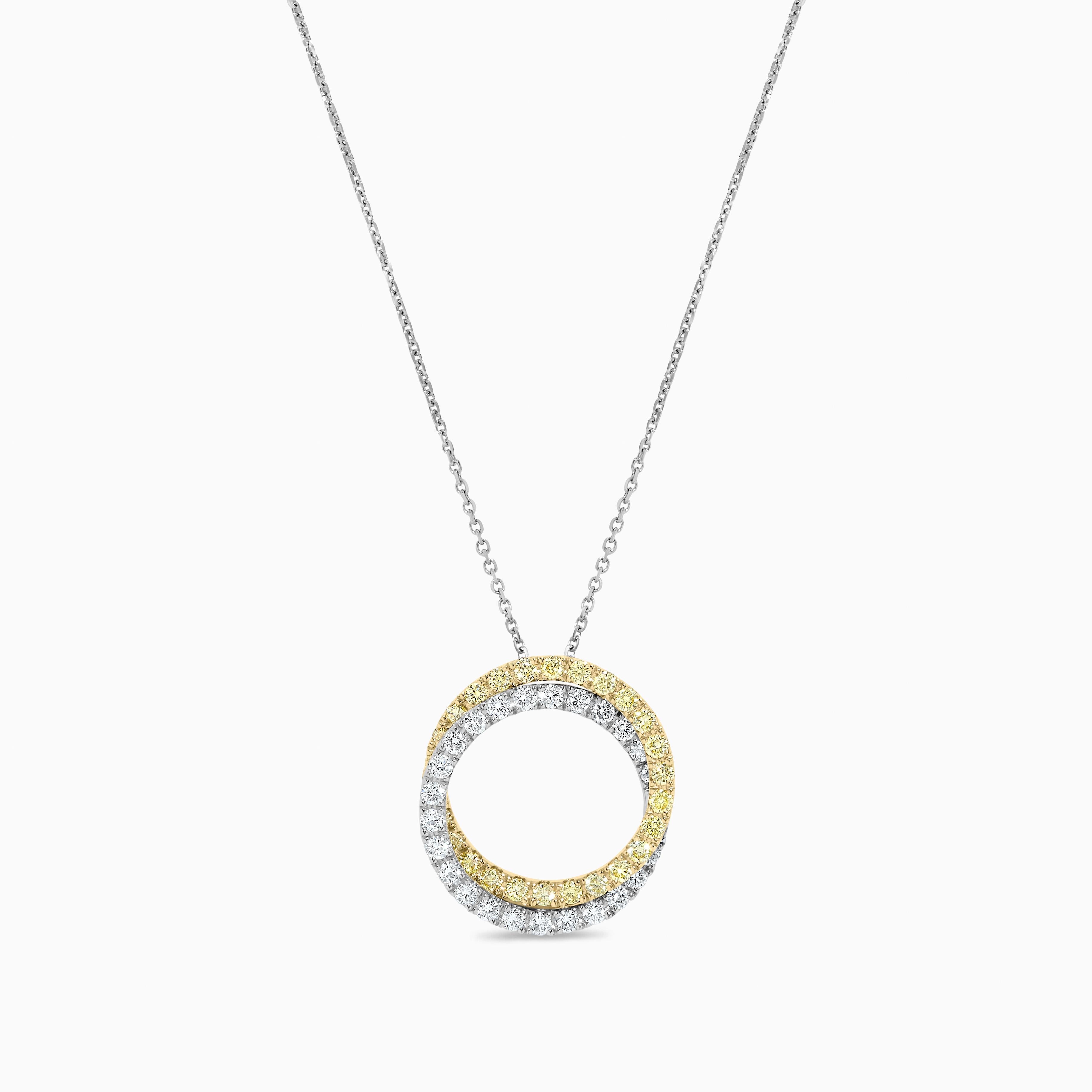 RareGemWorld's classic diamond necklace. Mounted in a beautiful 18K Yellow and White Gold setting with natural round yellow diamond melee complimented by natural round white diamond melee. This necklace is guaranteed to impress and enhance your