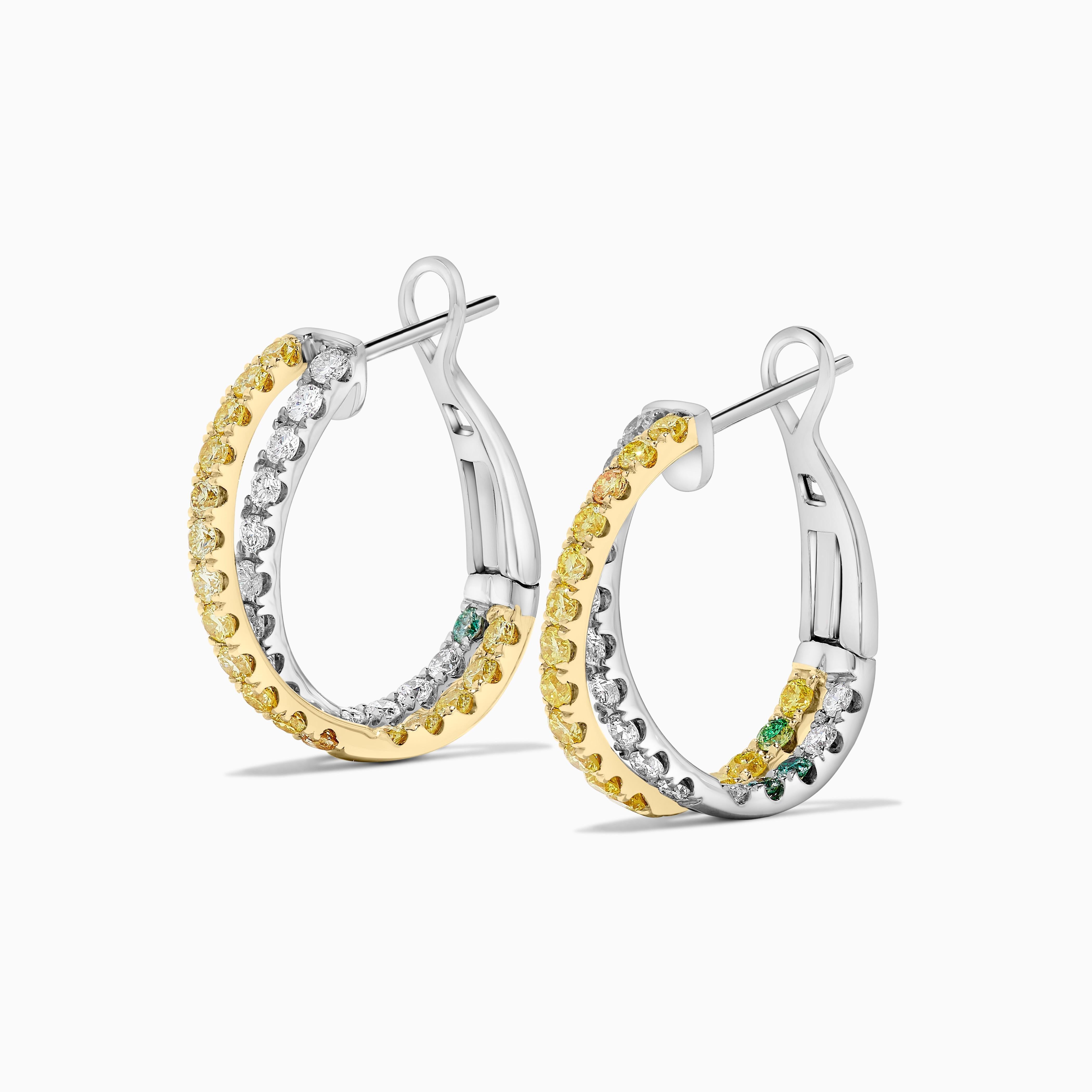 Raregemworld propose de magnifiques boucles d'oreilles en diamant naturel de taille ronde. Montée dans une belle monture en or jaune et blanc 18 carats, avec une mêlée de diamants jaunes ronds naturels et une mêlée de diamants blancs ronds naturels