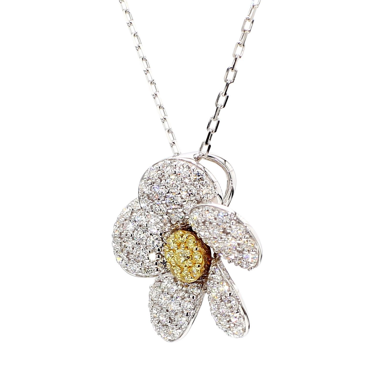 Il bellissimo ciondolo con diamante di RareGemworld. Montato in una splendida montatura in oro giallo e bianco 18 carati con un diamante giallo naturale rotondo e un diamante bianco naturale rotondo. Questo ciondolo è destinato a stupire e ad