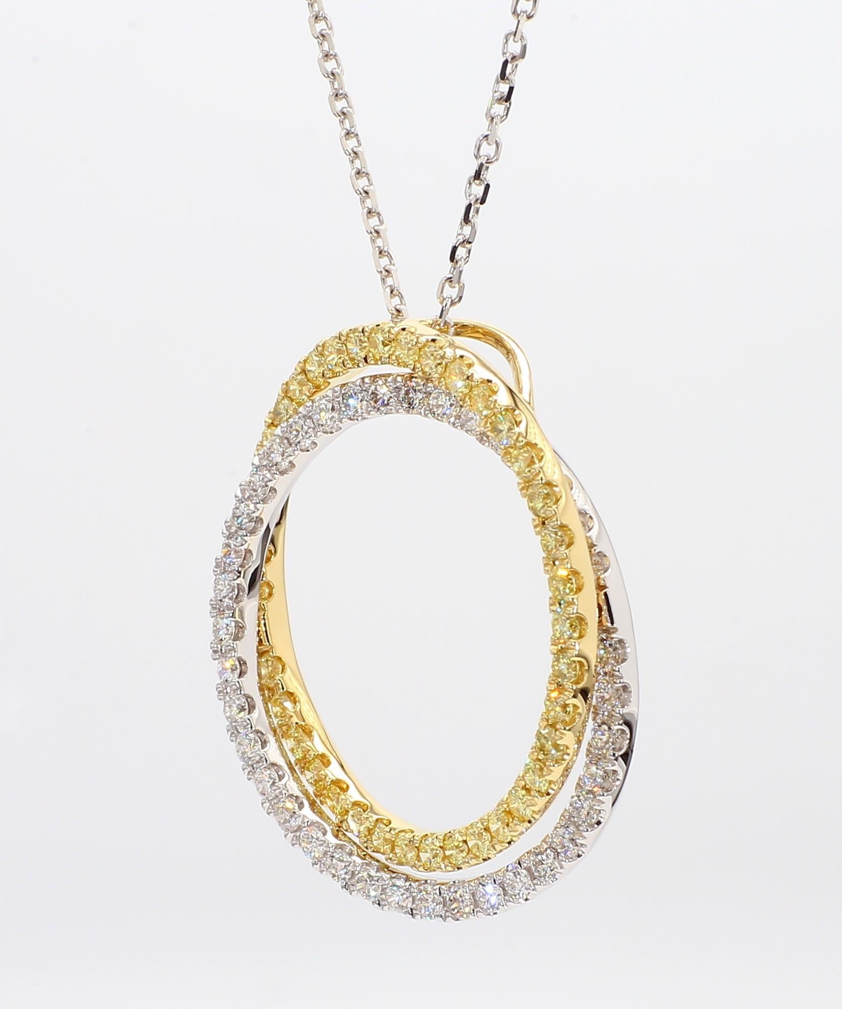 Il bellissimo ciondolo con diamante di RareGemworld. Montato in una splendida montatura in oro giallo e bianco 18 carati con un diamante giallo naturale rotondo e un diamante bianco naturale rotondo. Questo ciondolo è destinato a stupire e ad
