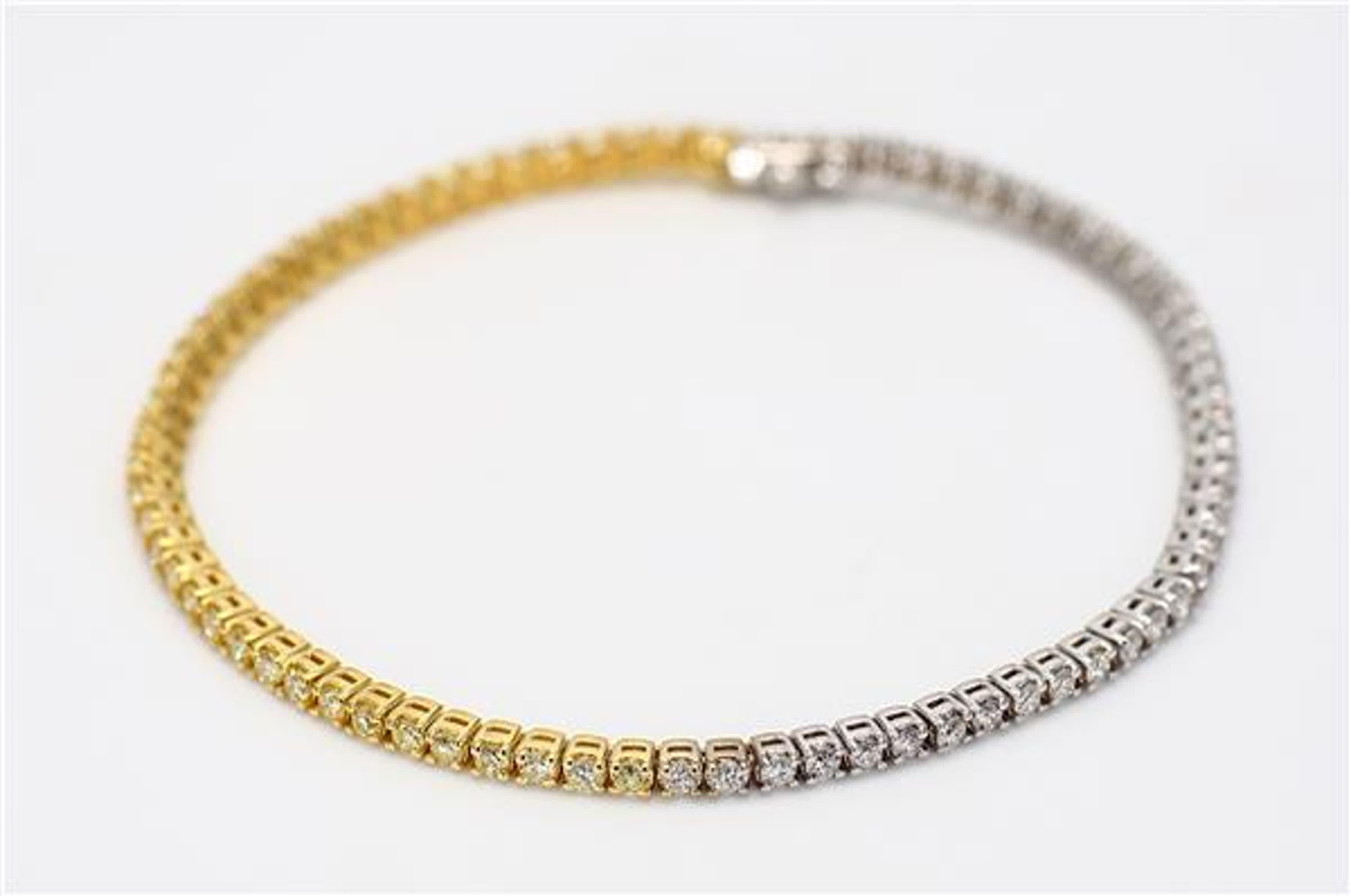 RareGemWorld's classic diamond bracelet. Mounted in a beautiful 18K Yellow and White Gold setting with natural round cut yellow diamond melee complimented by natural round cut white diamond melee. This bracelet is guaranteed to impress and will