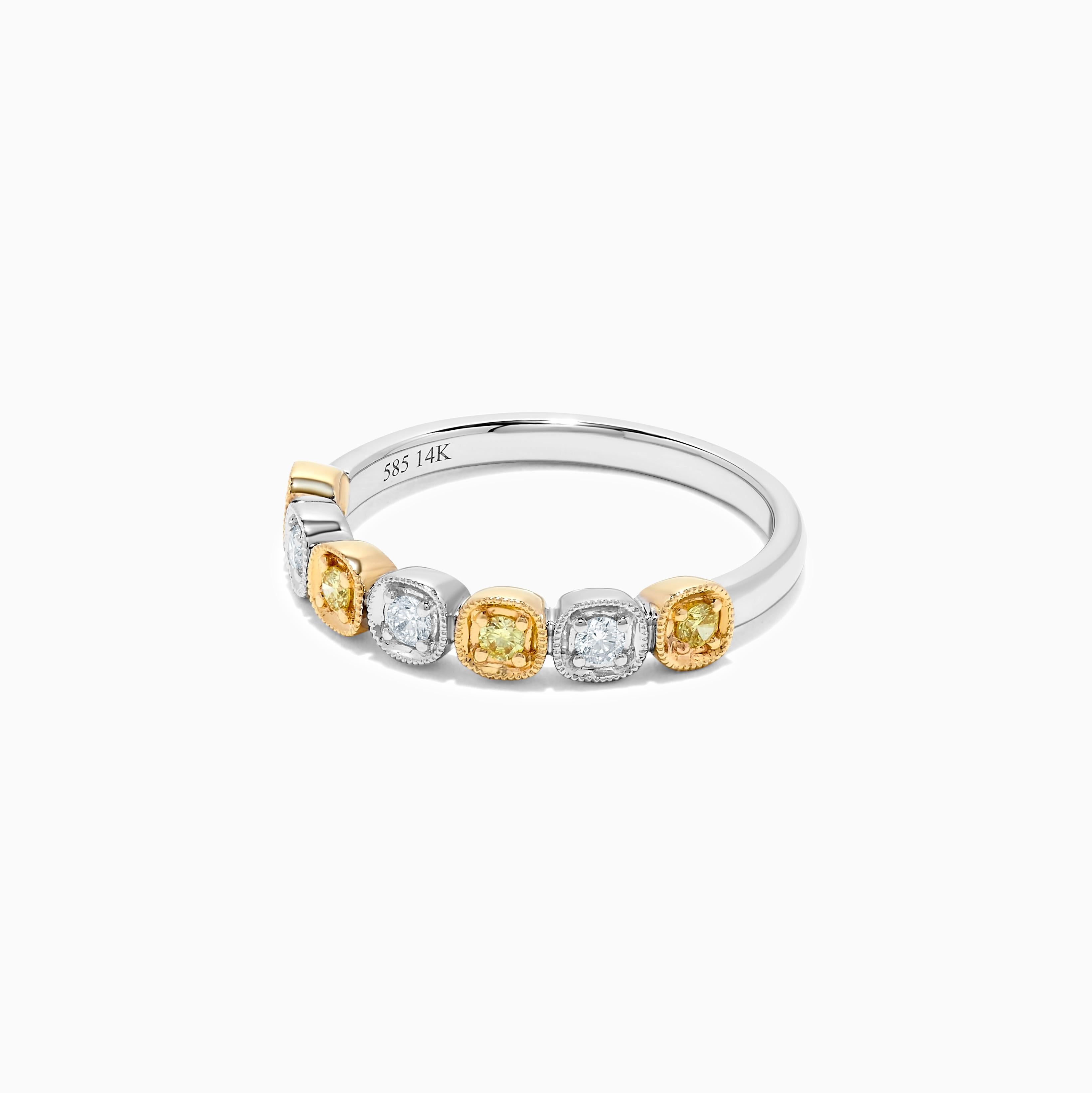 RareGemWorld's classic diamond band. Mounted in a beautiful 14K Yellow and White Gold setting with natural round yellow diamond melee complimented by natural round white diamond melee. This band is guaranteed to impress and enhance your personal