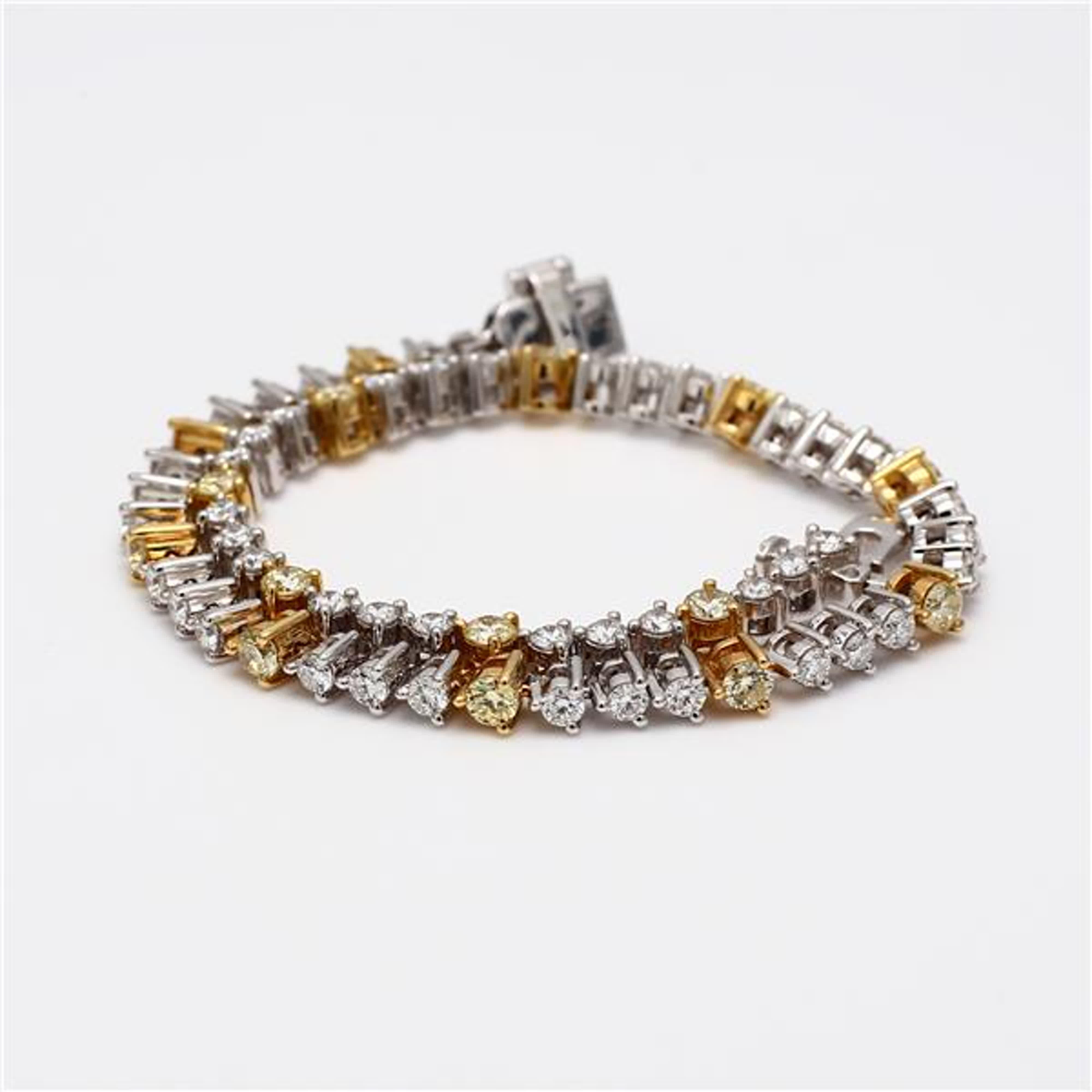 RareGemWorld's classic natural round cut yellow diamond bracelet. Mounted in a beautiful 14K Yellow and White Gold setting with 10 natural round cut yellow diamonds. The yellow diamonds are surrounded by small round natural white diamond melee. This