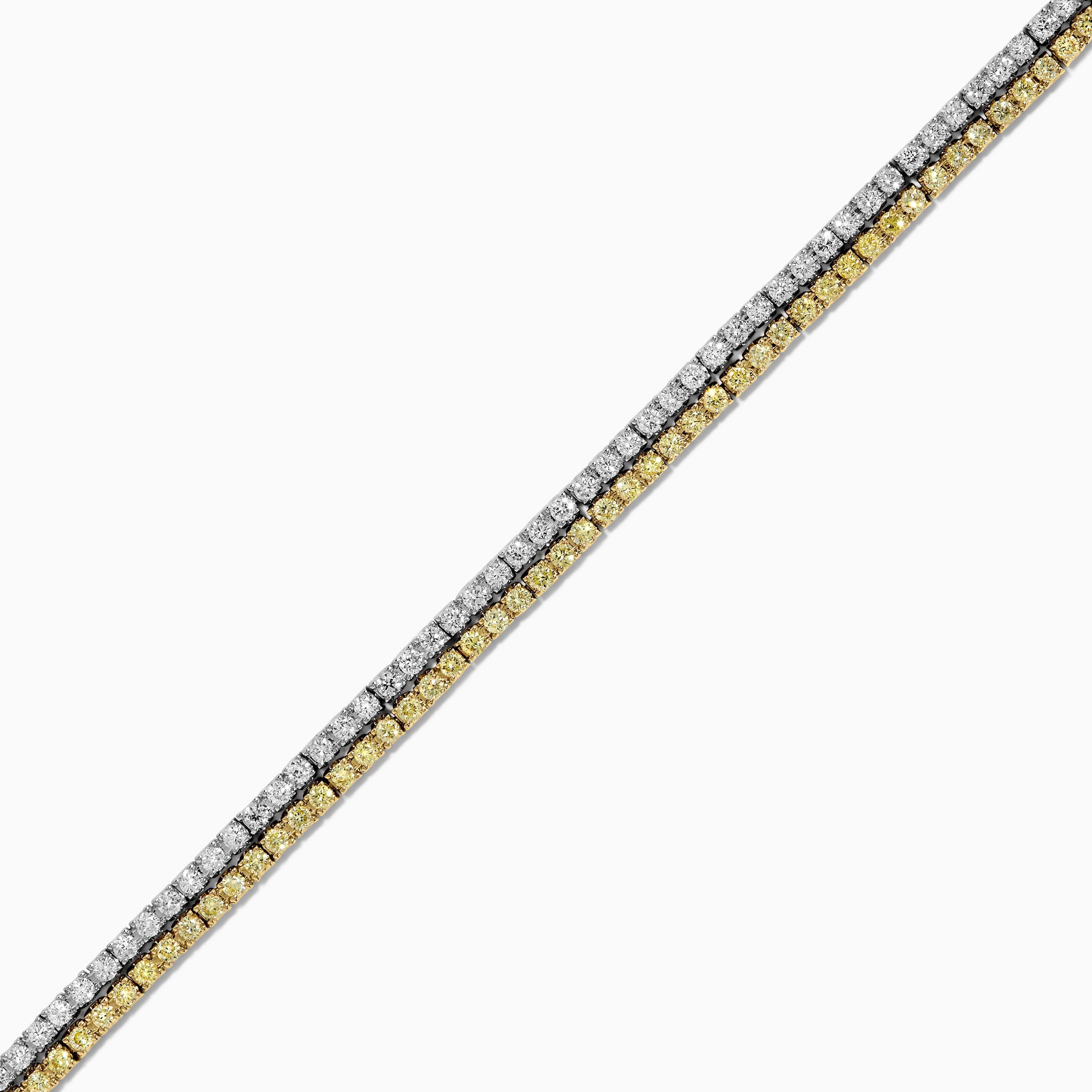 Le magnifique bracelet en diamants de Raregemworld. Monté dans une belle monture en or jaune et blanc 18 carats avec une mêlée de diamants jaunes de taille ronde naturelle complétée par une mêlée de diamants blancs de taille ronde naturelle. Ce