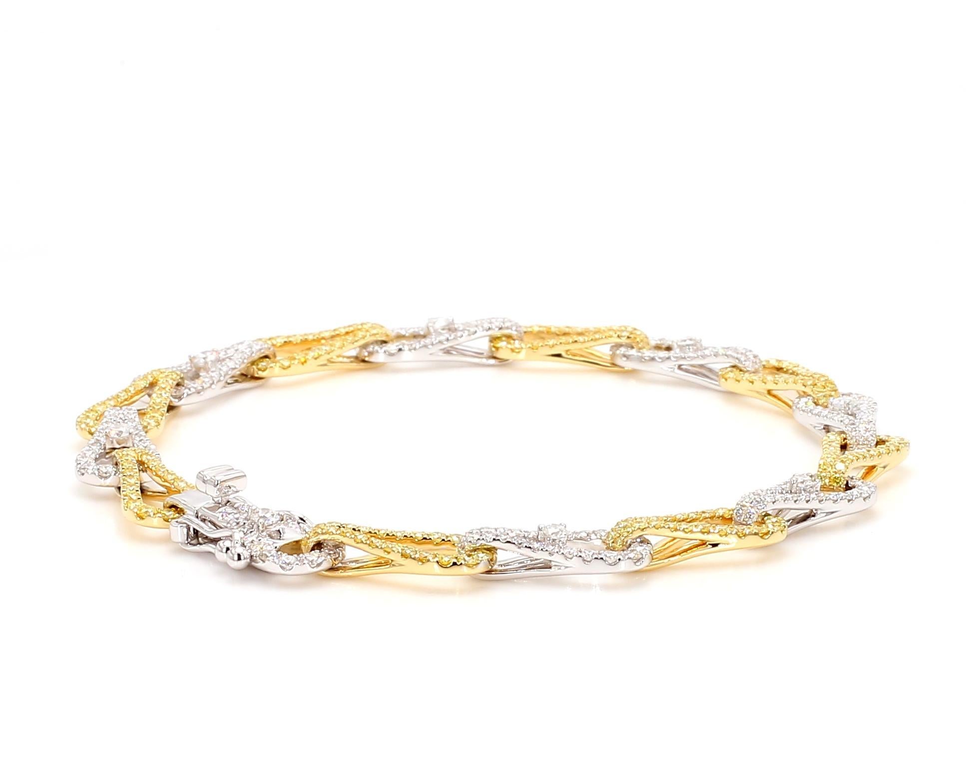 Le magnifique bracelet en diamants de Raregemworld. Monté dans une belle monture en or jaune et blanc 18 carats avec une mêlée de diamants jaunes de taille ronde naturelle complétée par une mêlée de diamants blancs de taille ronde naturelle. Ce