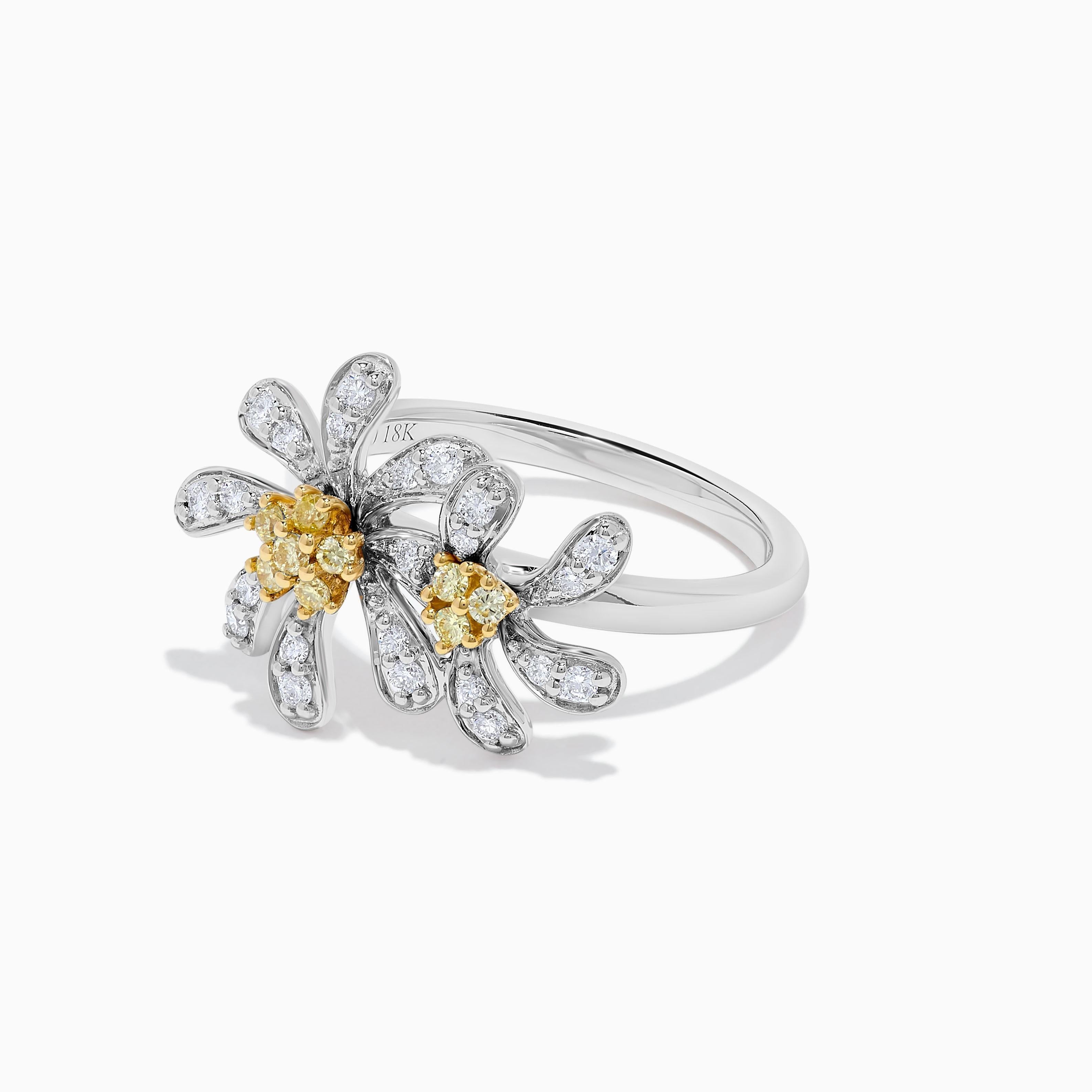 Anillo de diamantes clásico de RareGemWorld. Montada en un precioso engaste de oro amarillo y blanco de 18 quilates con una melee de diamante amarillo redondo natural complementada con una melee de diamante blanco redondo natural. Este anillo