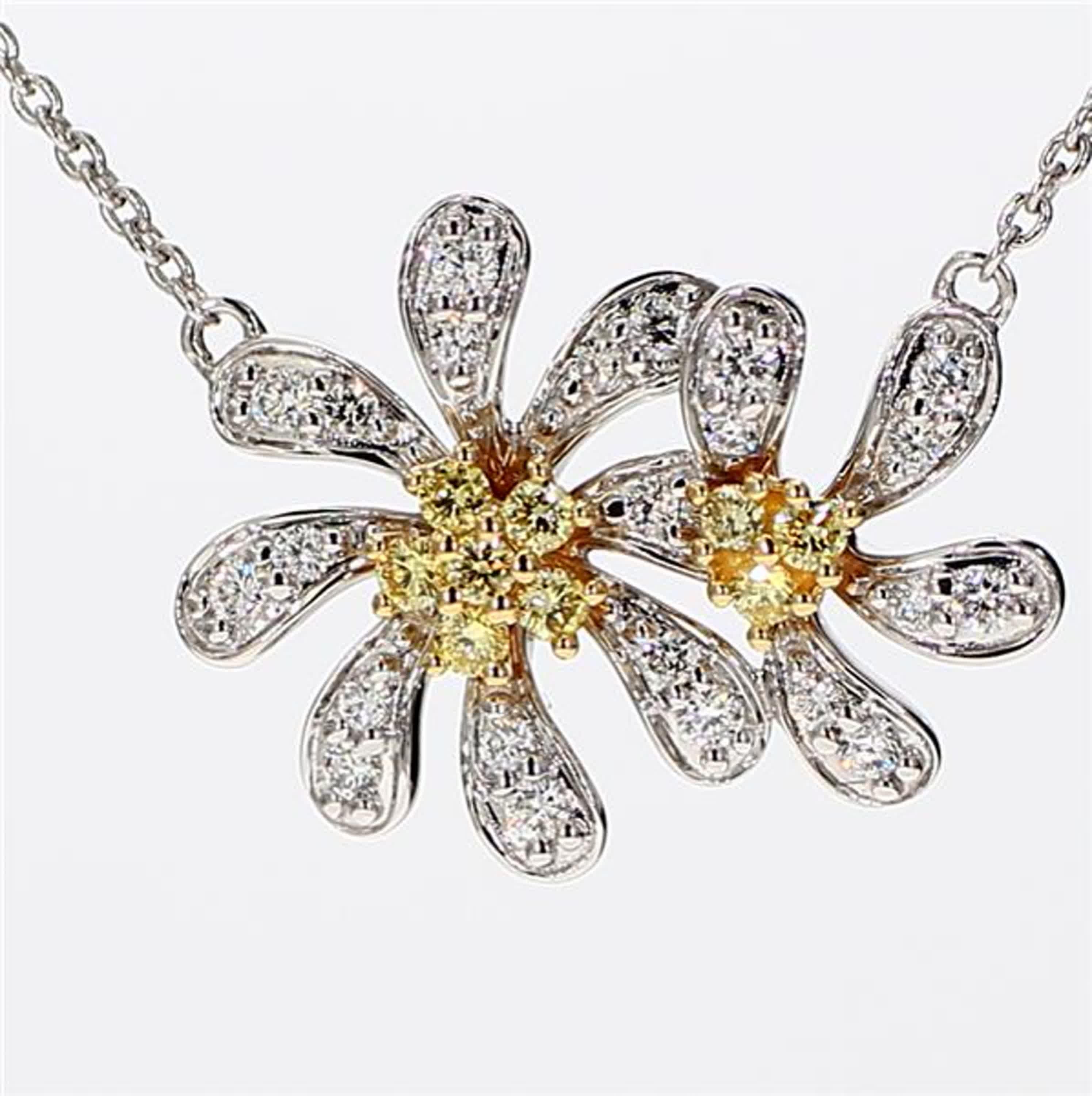 RareGemWorld's classic diamond pendant. Mounted in a beautiful 18K Yellow and White Gold setting with natural round yellow diamond melee complimented by natural round white diamond melee. This pendant is guaranteed to impress and enhance your