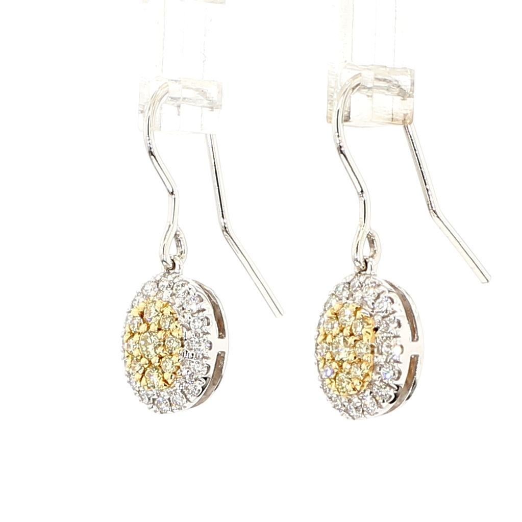 I bellissimi orecchini di diamanti di RareGemworld. Montato in una splendida montatura in oro giallo e bianco 14 carati con diamanti gialli naturali a taglio rotondo, completati da diamanti bianchi naturali a taglio rotondo. Questi orecchini sono