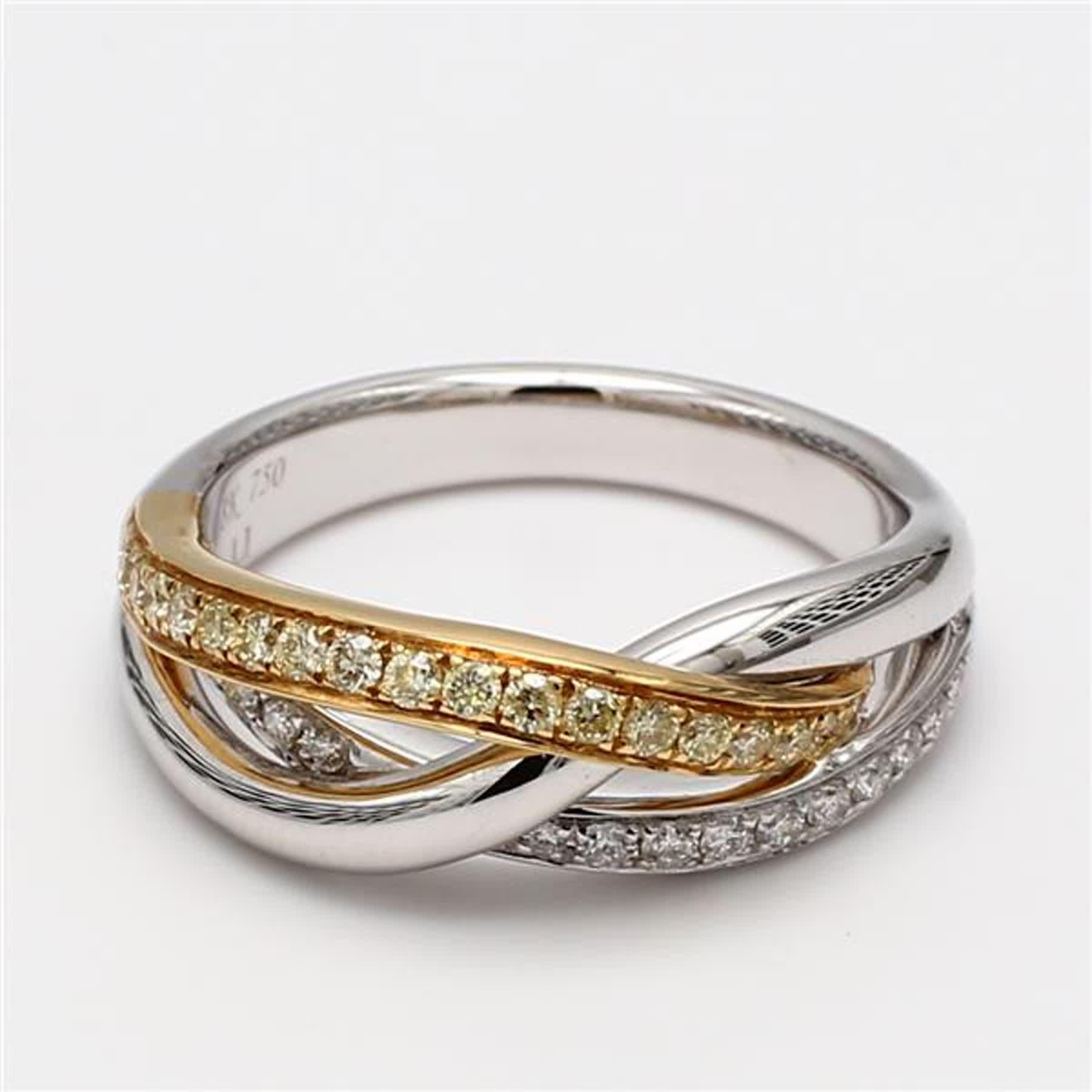 RareGemWorld's classic diamond band. Mounted in a beautiful 18K Yellow and White Gold setting with natural round yellow diamond melee complimented by natural round white diamond melee. This band is guaranteed to impress and enhance your personal