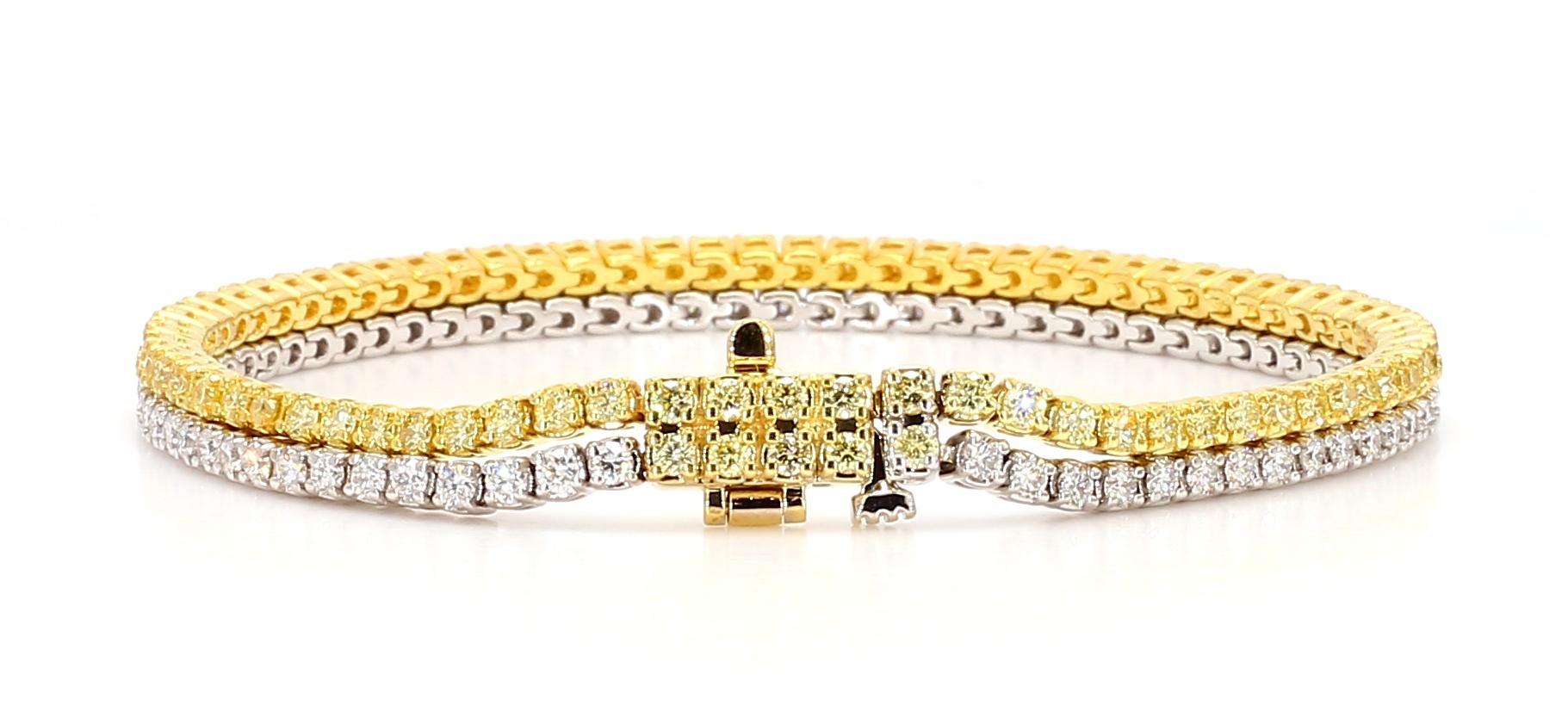 RareGemWorld's beautiful diamond bracelet. Mounted in a beautiful 18K Yellow and White Gold setting with natural round cut yellow diamonds and white diamonds. The yellow and white diamond melee compliment one another in a double band bracelet