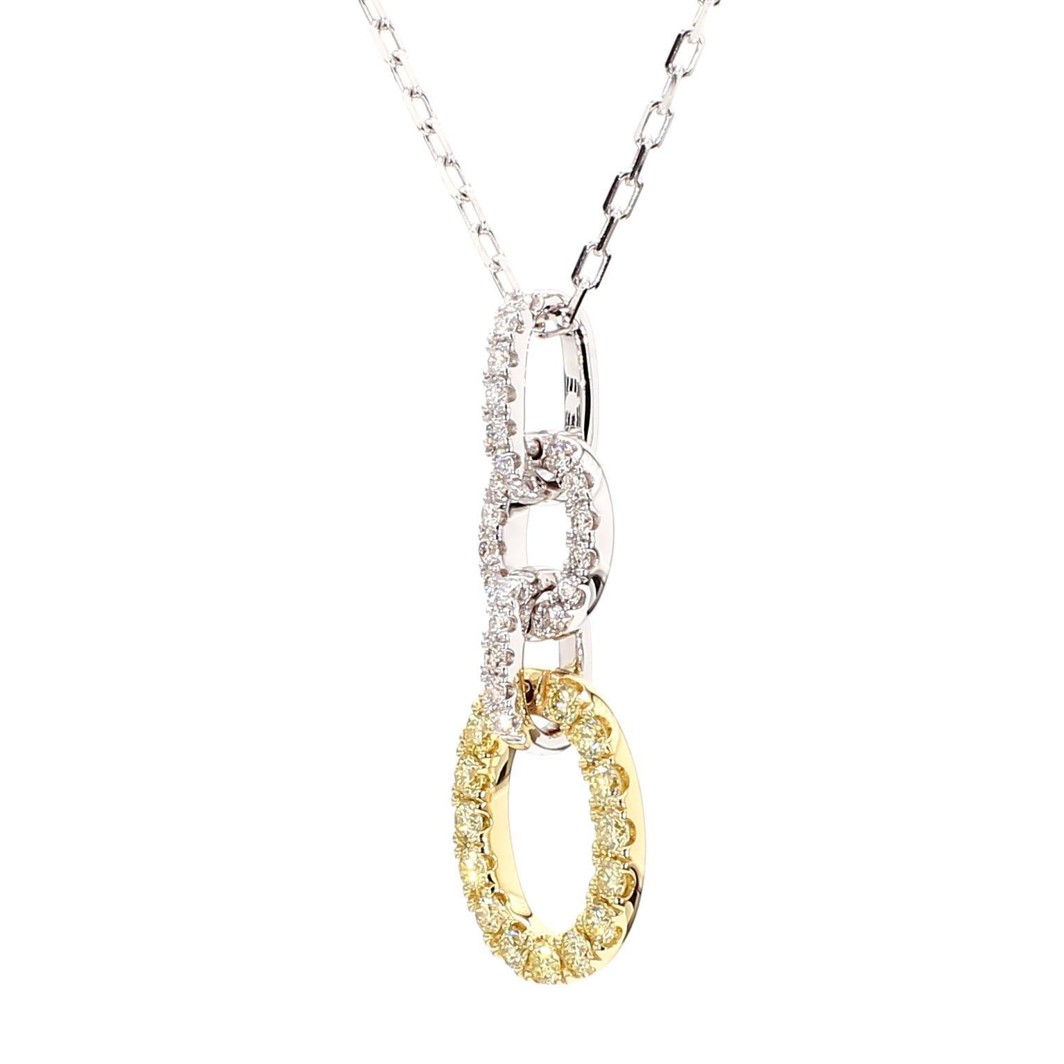 RareGemWorld's beautiful diamond pendant. Mounted in a beautiful 18K Yellow and White Gold setting with natural round yellow diamond melee complimented by natural round white diamond melee. This pendant is guaranteed to impress and enhance your