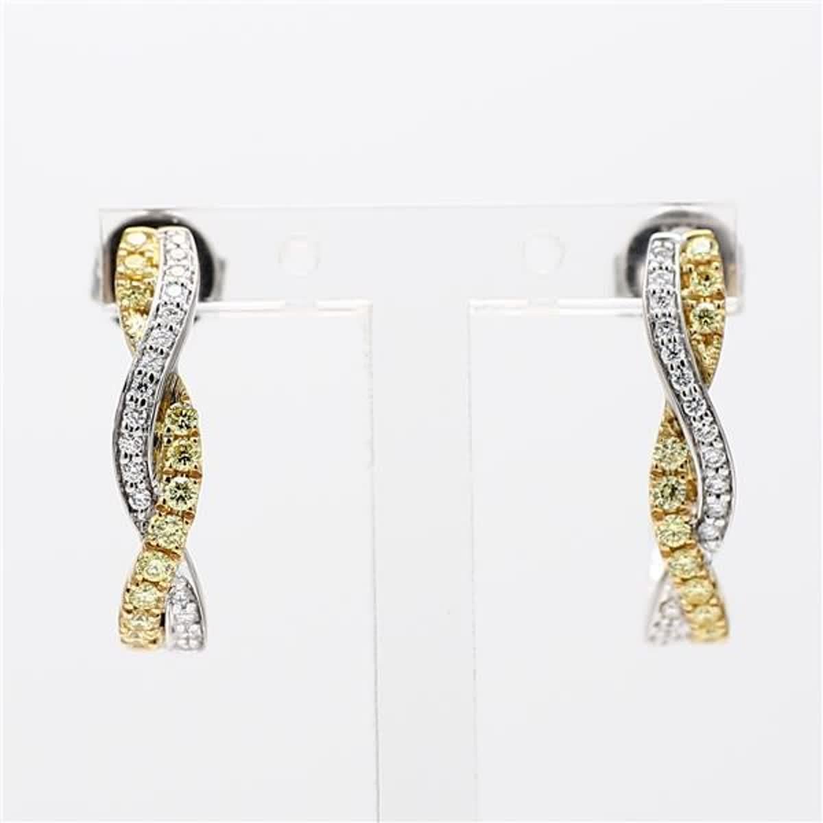 RareGemWorld's classic diamond earrings. Mounted in a beautiful 18K Yellow and White Gold setting with natural round cut yellow diamonds. These earrings include both natural round yellow diamond melee and natural round white diamond melee in a
