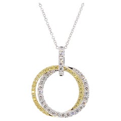 Ciondolo a goccia in oro con diamante giallo naturale e bianco da .62 carati TW