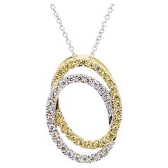 Ciondolo a goccia in oro con diamante giallo naturale e bianco da .63 carati TW