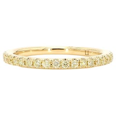 Fede nuziale in oro giallo Nature con diamante rotondo da 0.35 carati TW