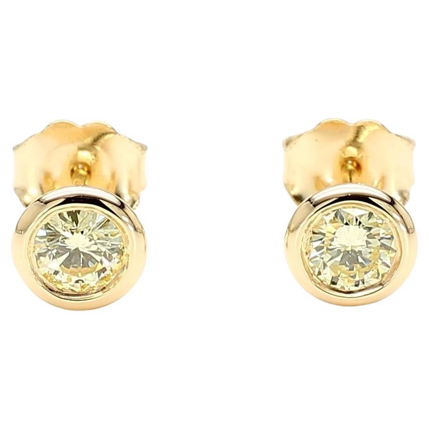 Orecchini con diamante giallo naturale rotondo da 0.41 carati TW in oro giallo