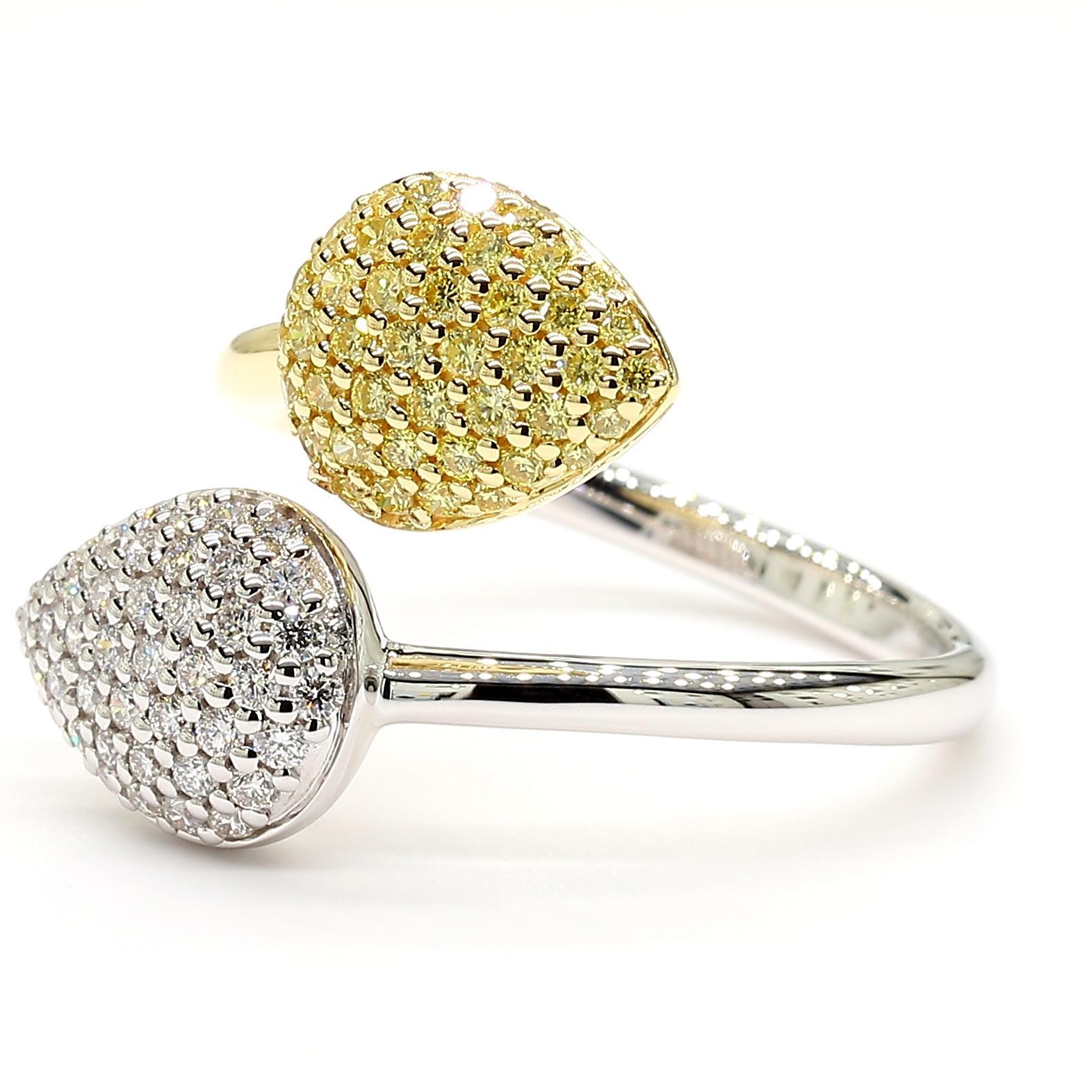 RareGemWorld's beautiful diamond cocktail ring. Mounted in a beautiful 18K Yellow and White Gold setting with natural round cut yellow diamonds complimented by natural round white diamond melee. This ring is guaranteed to impress and enhance your