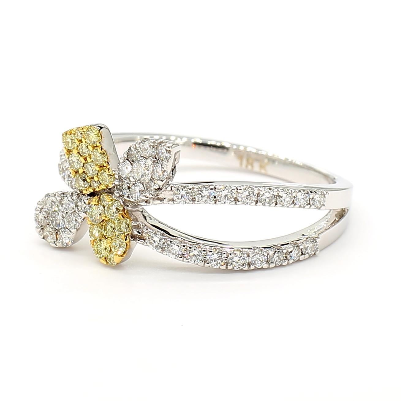 RareGemWorld's beautiful diamond cocktail ring. Mounted in a beautiful 18K Yellow and White Gold setting with natural round cut yellow diamonds complimented by natural round white diamond melee. This ring is guaranteed to impress and enhance your