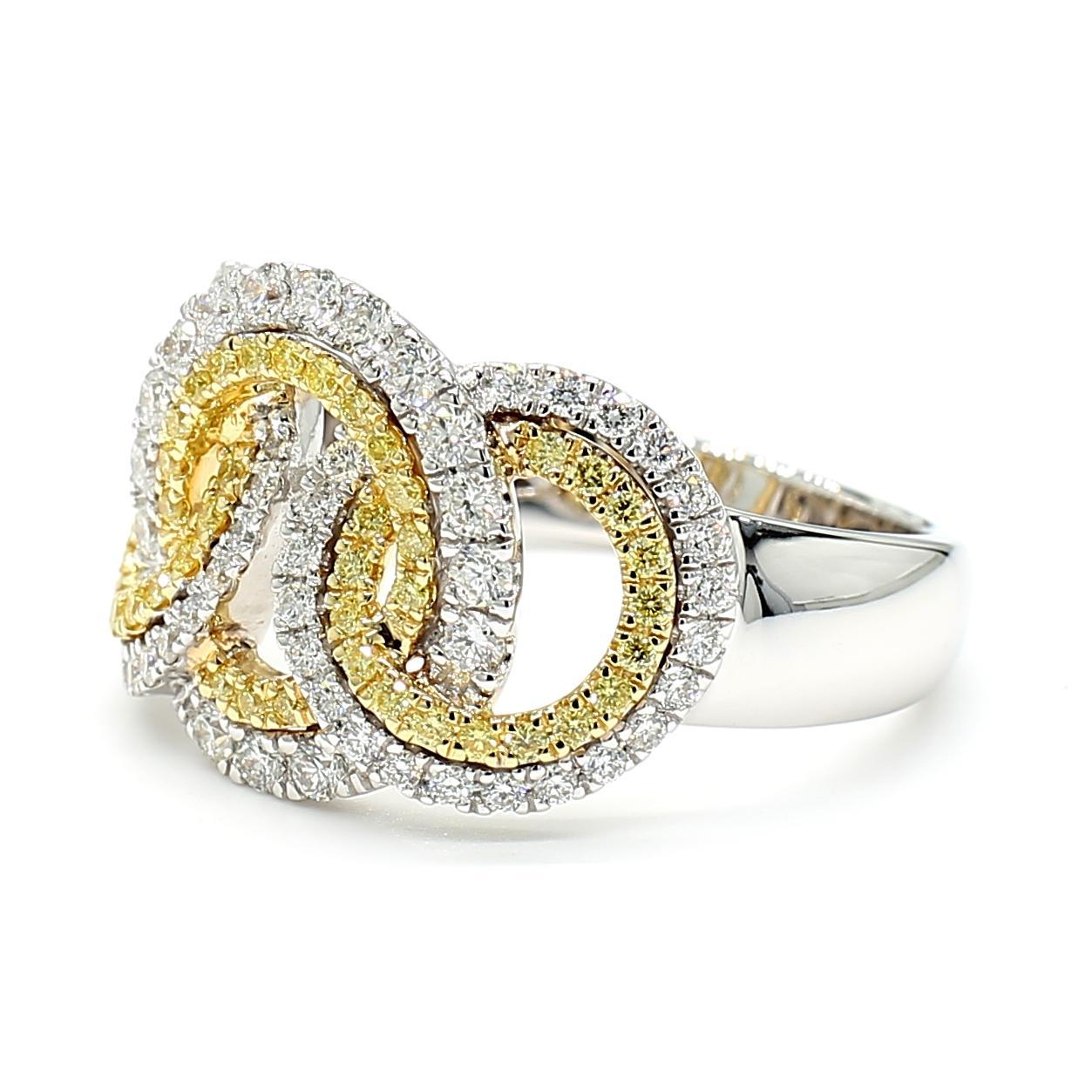RareGemWorld's beautiful diamond cocktail ring. Mounted in a beautiful 18K Yellow and White Gold setting with natural round cut yellow diamonds complimented by natural round white diamond melee. This ring is guaranteed to impress and enhance your