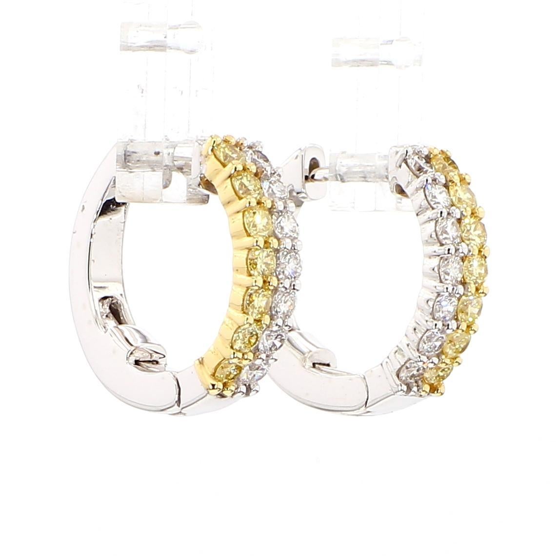 I bellissimi orecchini di diamanti di RareGemworld. Montato in una splendida montatura in oro giallo e bianco 18 carati con diamanti gialli naturali a taglio rotondo completati da diamanti bianchi rotondi. Questi orecchini sono garantiti per stupire