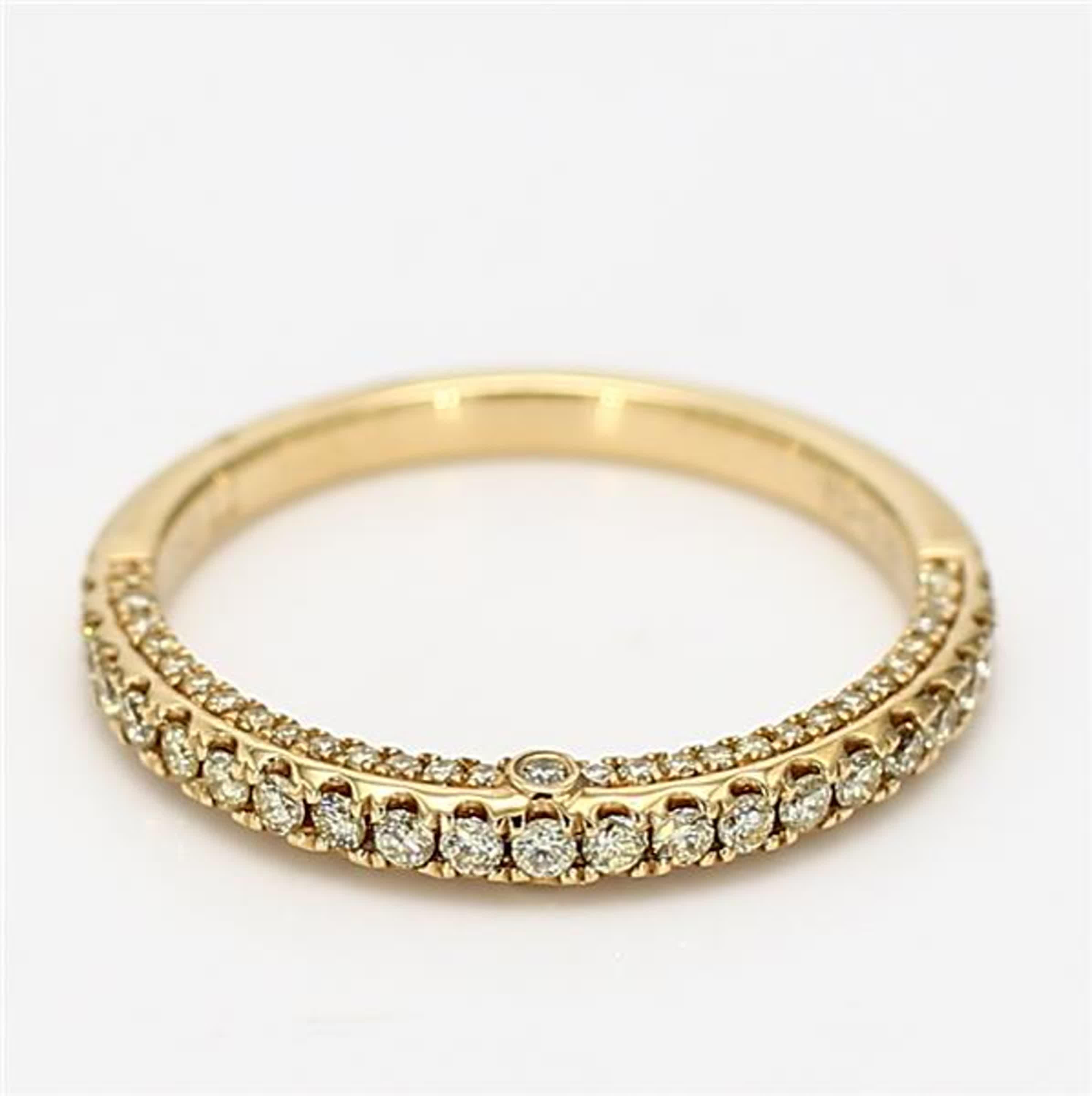 RareGemWorld's classic diamond band. Mounted in a beautiful 18K Yellow Gold setting with natural round yellow diamond melee. This band is guaranteed to impress and enhance your personal collection!

Total Weight: .39cts

Natural Round Yellow