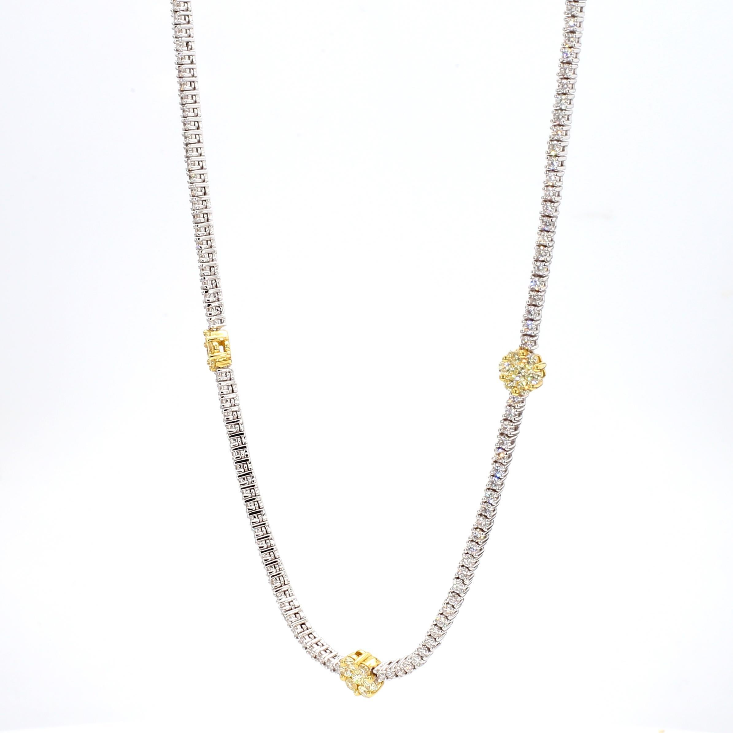 RareGemWorld's beautiful diamond necklace. Mounted in a beautiful 18K Yellow and White Gold setting with natural round yellow diamond melee complimented by natural round white diamond melee. This necklace is guaranteed to impress and enhance your