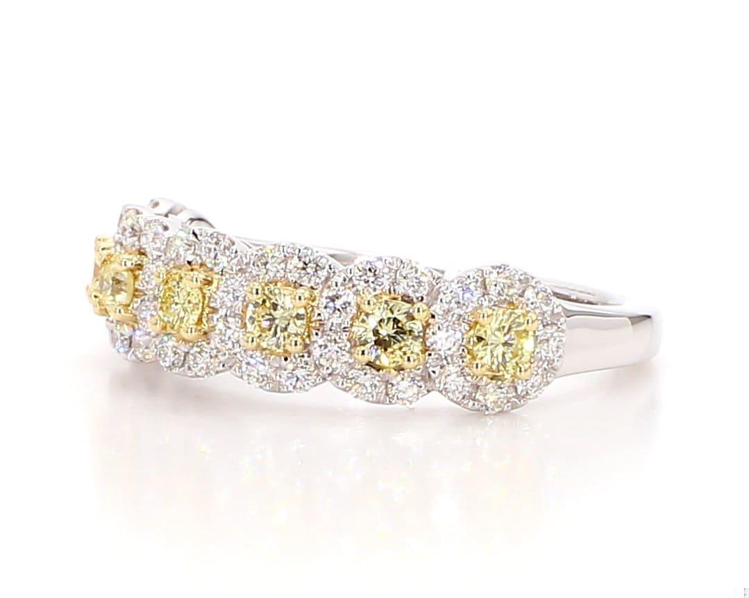 La bellissima fascia di diamanti di Raregemworld. Montato in una splendida montatura in oro giallo e bianco 18 carati con diamanti gialli naturali a taglio rotondo, completati da diamanti bianchi naturali a taglio rotondo. Questa banda è garantita