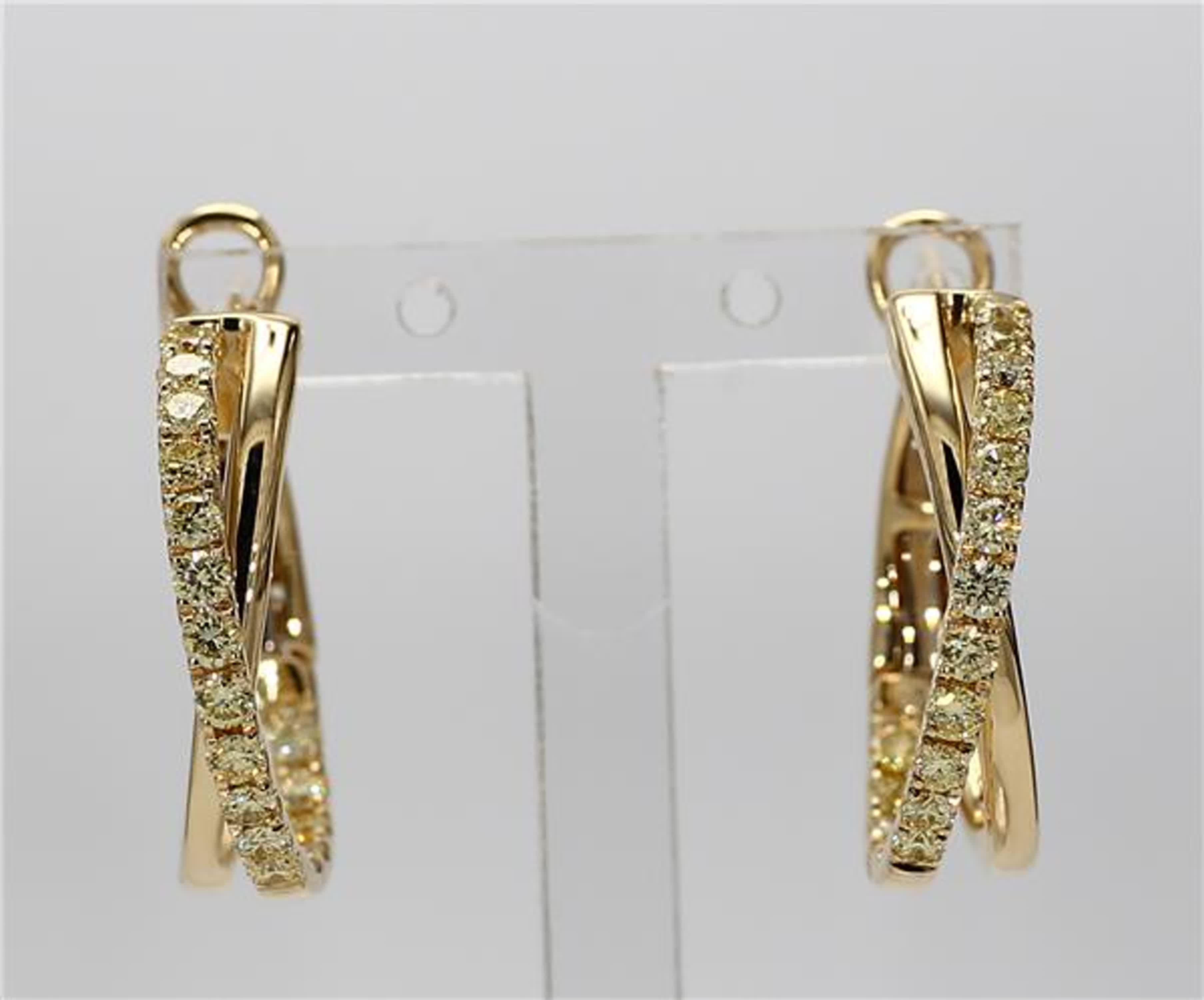 RareGemWorld's classic diamond earrings. Mounted in a beautiful 18K Yellow Gold setting with natural round cut yellow diamonds. These earrings are guaranteed to impress and enhance your personal collection!

Total Weight: .96cts

Length x Width: