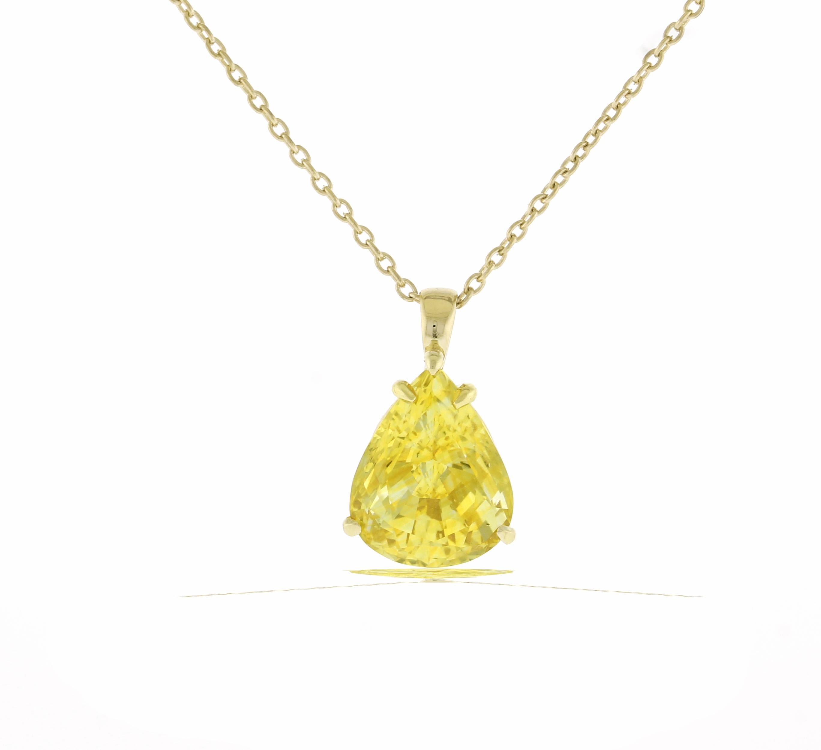 A wonderful natural yellow pear-shaped sapphire is gracefully suspended from a gold chain necklace.
• Designer: Pampillonia
• Metal: 18 karat gold
• Natural non heated Sapphire weighs 11.55
• Pear-shape =16.34*11.86	

 