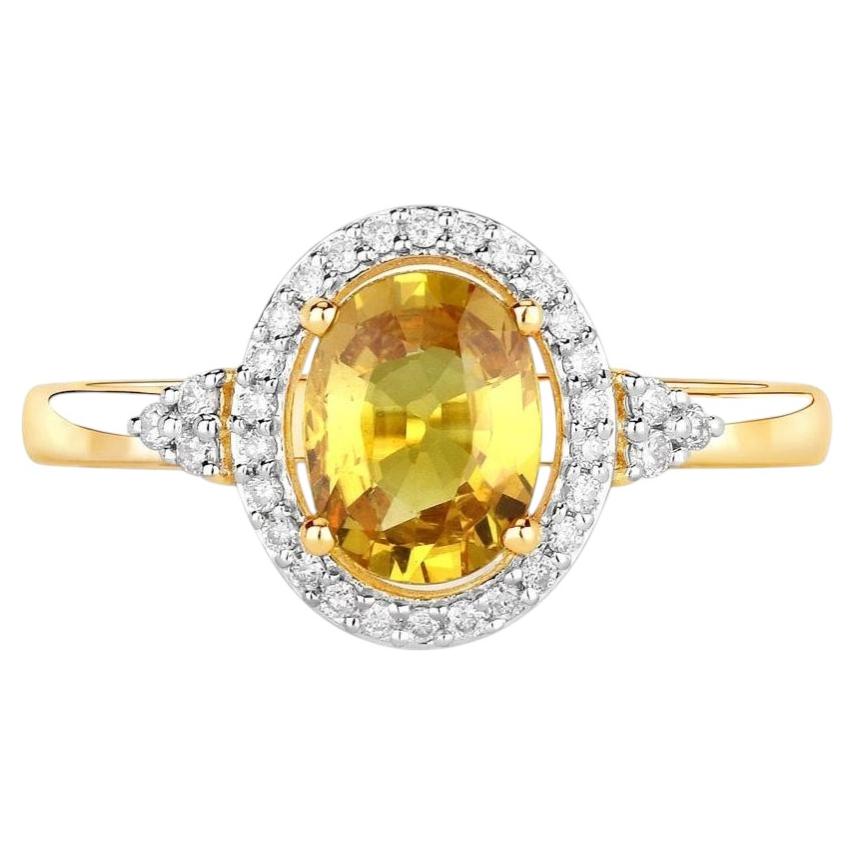 Anello con zaffiro giallo naturale e diamanti 1,72 carati in oro giallo 14 carati