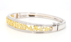 Armreif aus Gold mit einem natürlichen gelben Trillion-Diamanten von 4,54 Karat TW