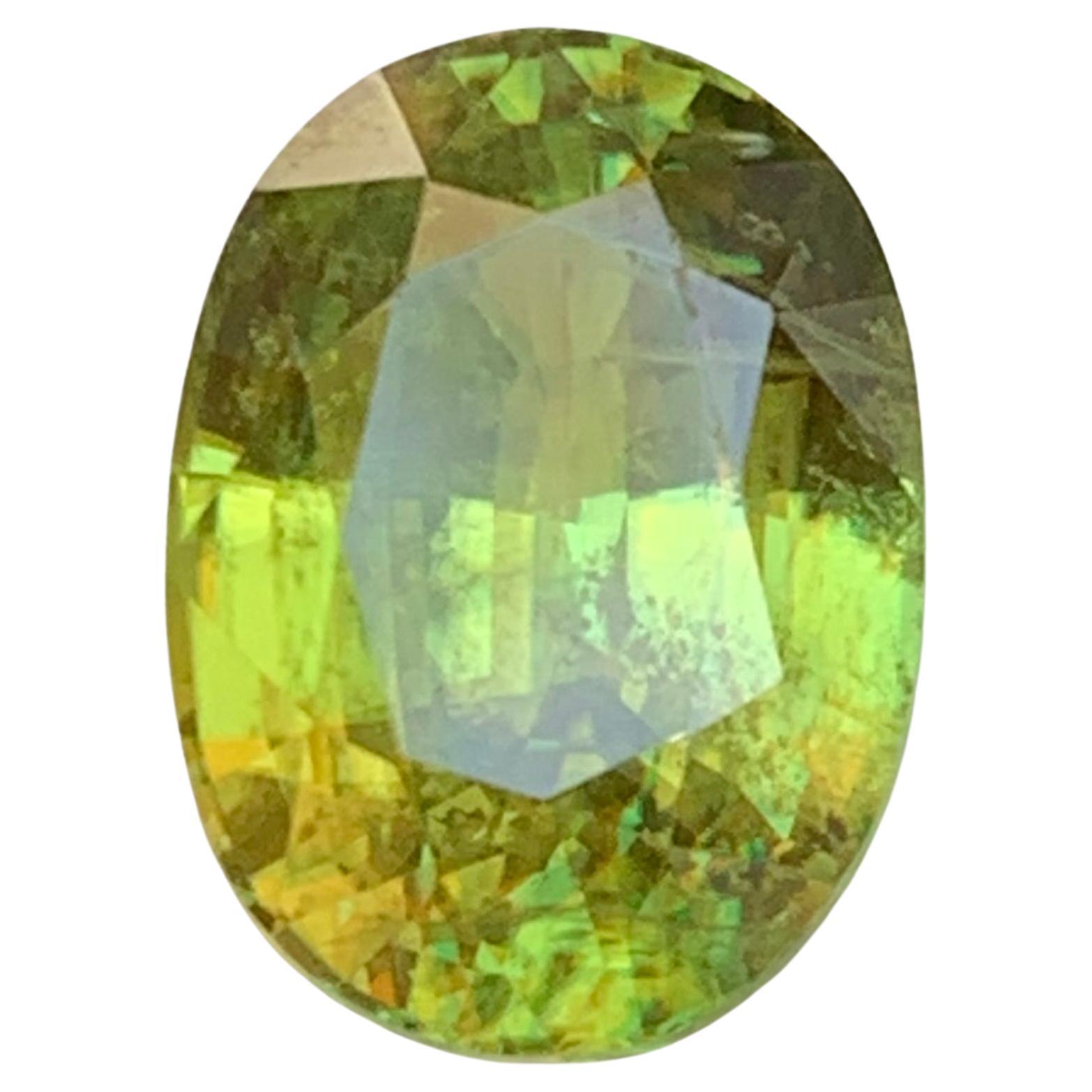 Natural Yellowish Green Sphene (Titanite) 6.67 Carat Oval Cut Loose Gemstone