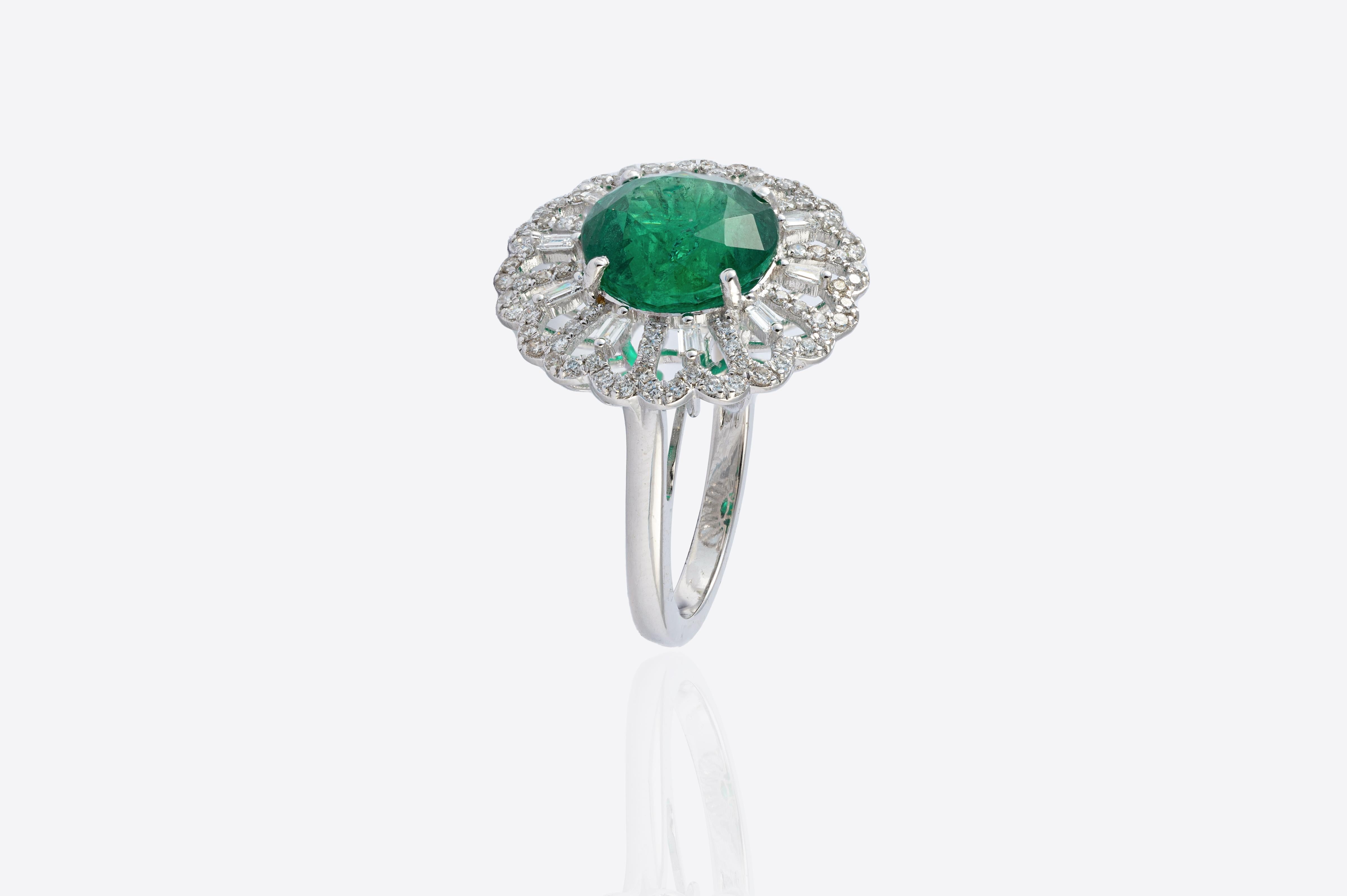 Dies ist eine schöne natürliche sambischen Smaragd Ring für das tägliche Tragen. der Smaragd ist von sehr hoher Qualität
und die Diamanten sind von sehr guter Vsi-Qualität und G-Farbe 
Smaragd : 5,71cts 
Diamanten : 0,77cts
Gold : 4.98g 
sehr