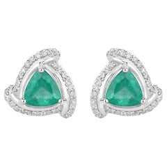 Pendientes de oro blanco de 14 quilates con esmeralda natural de Zambia y halo de diamantes