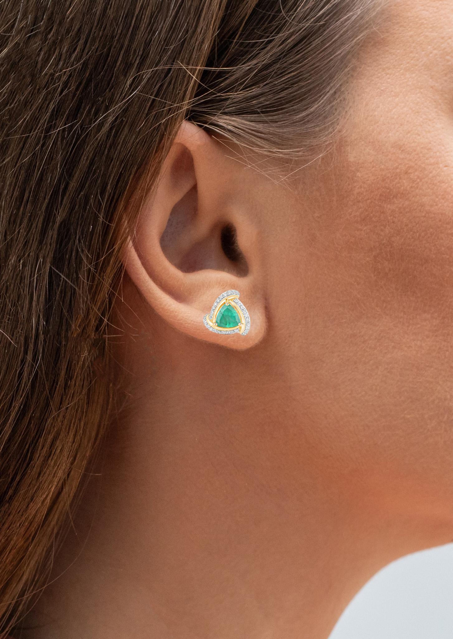 It comes with the appraisal by GIA GG/AJP
All Gemstones are Natural  
2 Trillion Cut Emeralds = 1.02 Carats 
66 Diamonds = 0.22 Carats
Metal: 14K Yellow Gold
Length: 11 mm