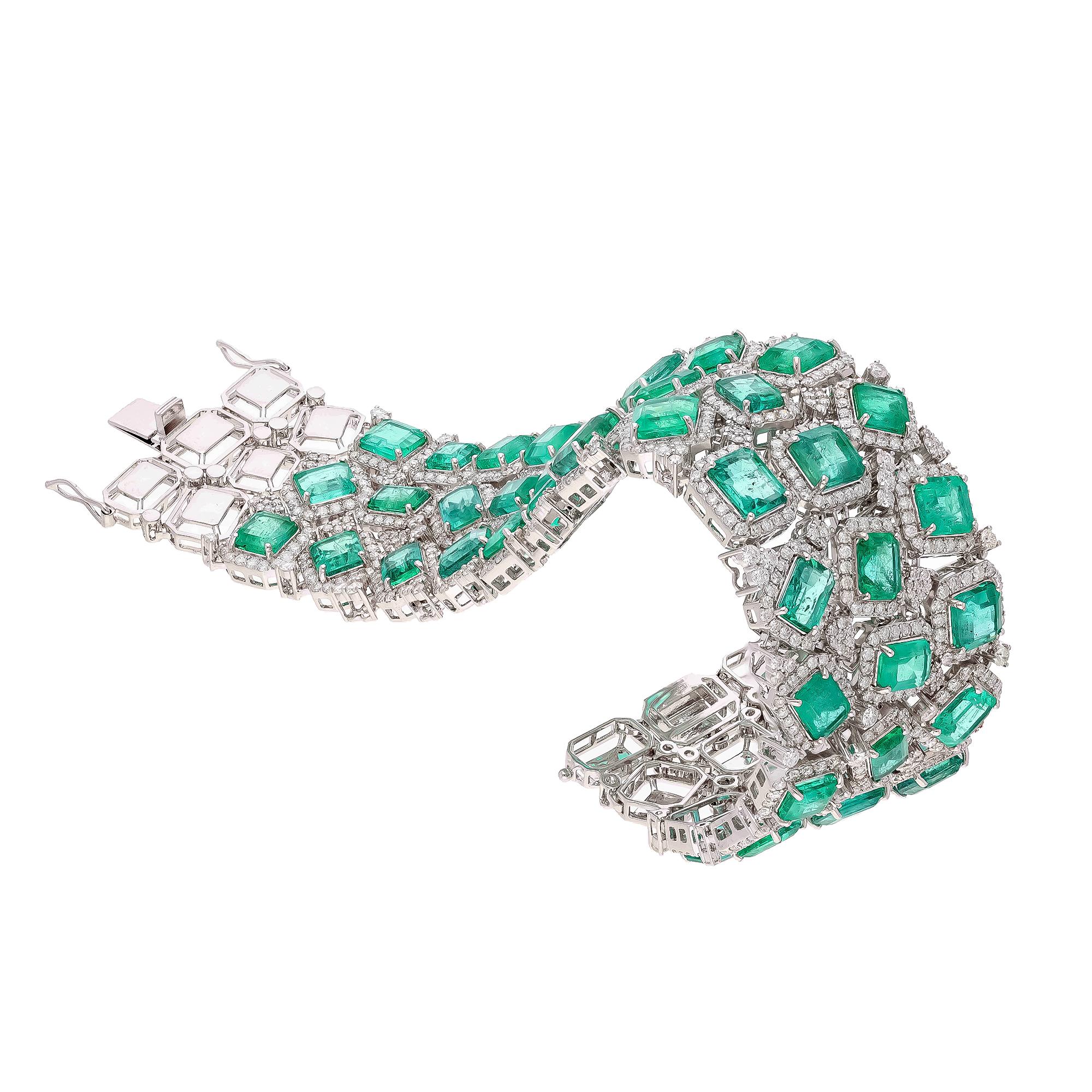 This is a stunning natural Zambian Emerald bracelet which has Emerald of very high quality and diamonds of very good quality . it has vsi clarity and G colour.

Emerald : 49.88cts

diamonds : 10.83 cts

gold : 76.148 gms

Its very hard to capture