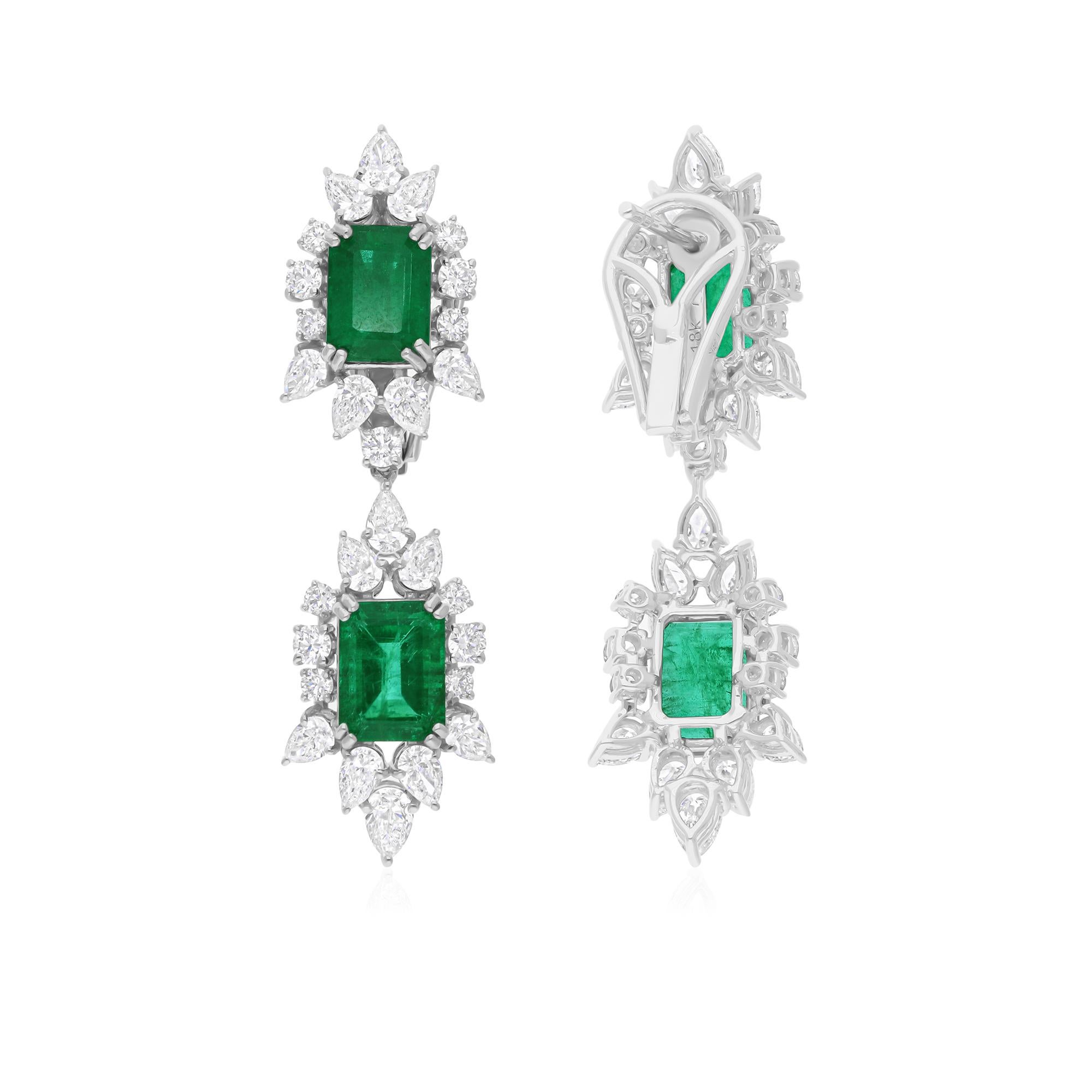 Cast from 14-karat gold, these exquisite earrings are handset with 5.84 carats Zambian emerald and 3.46 carats of sparkling diamonds.

FOLLOW SPECTRUM JEWELS storefront to view the latest collection & exclusive pieces. Spectrum Jewels is proudly