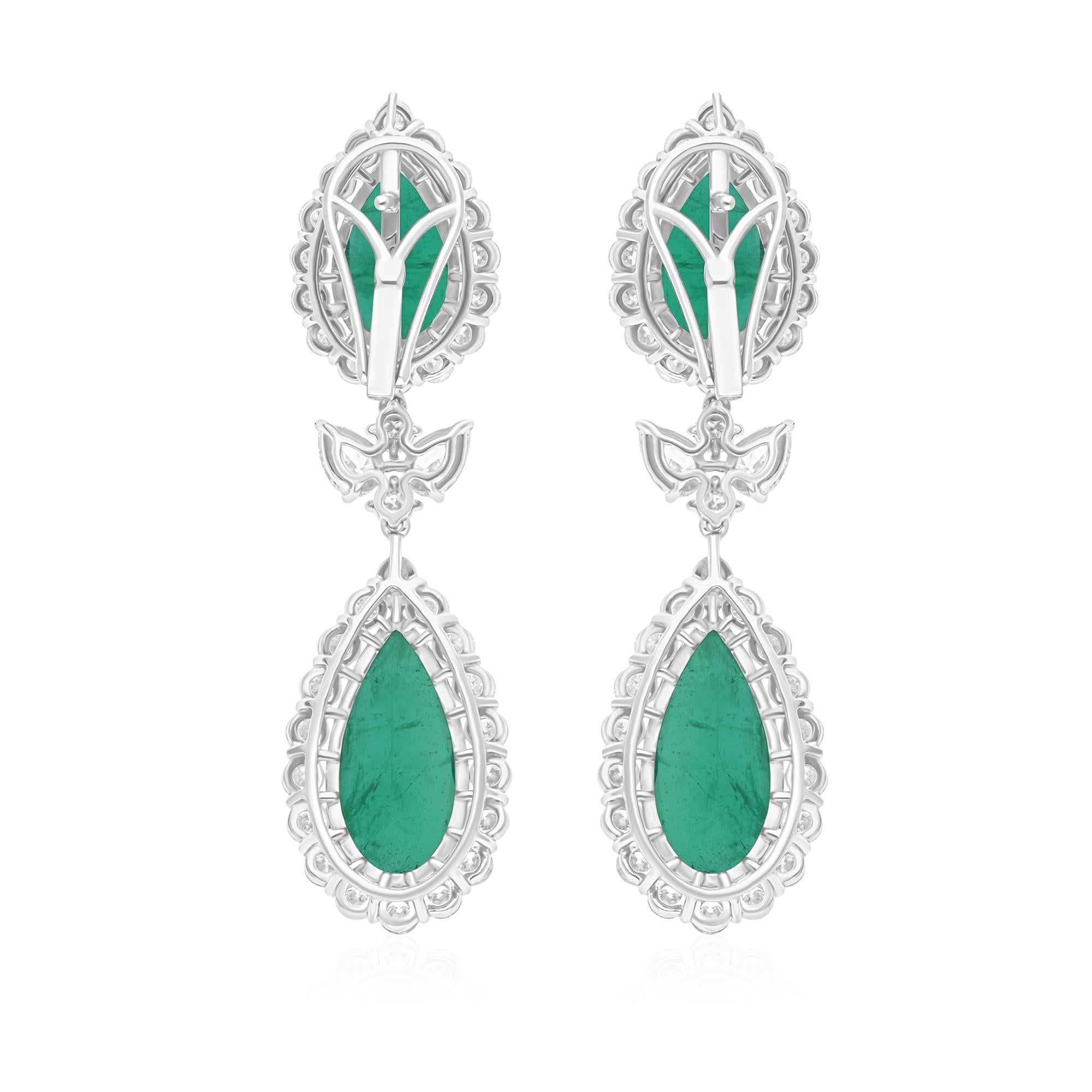 Cast from 18-karat gold, these exquisite earrings are handset with 15.41 carats Zambian emerald and 5.28 carats of sparkling diamonds.

FOLLOW SPECTRUM JEWELS storefront to view the latest collection & exclusive pieces. Spectrum Jewels is proudly