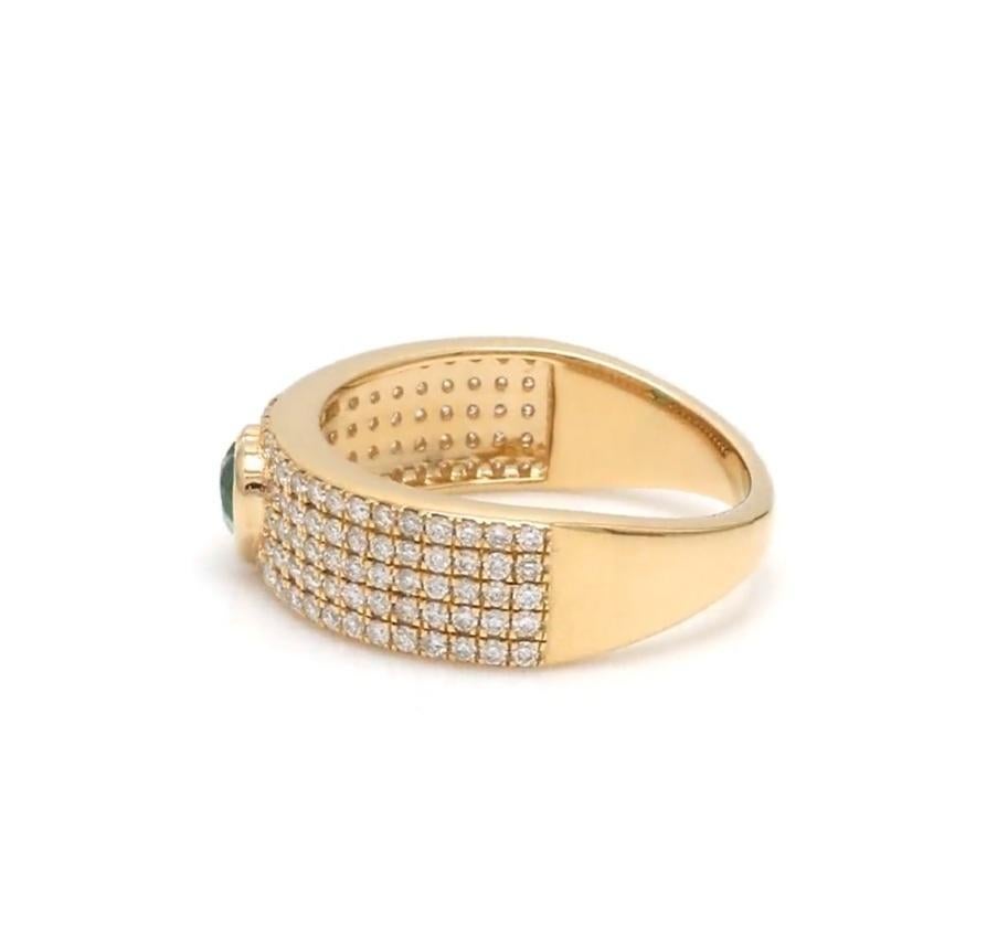 Bague en or 18k ornée d'une émeraude naturelle zambienne et d'un diamant en vente 1